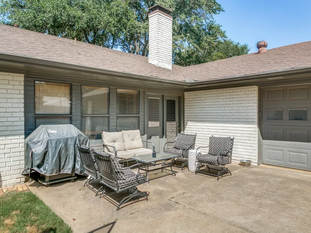 Step outside to a private patio area tucked between the home and side-entry garage.