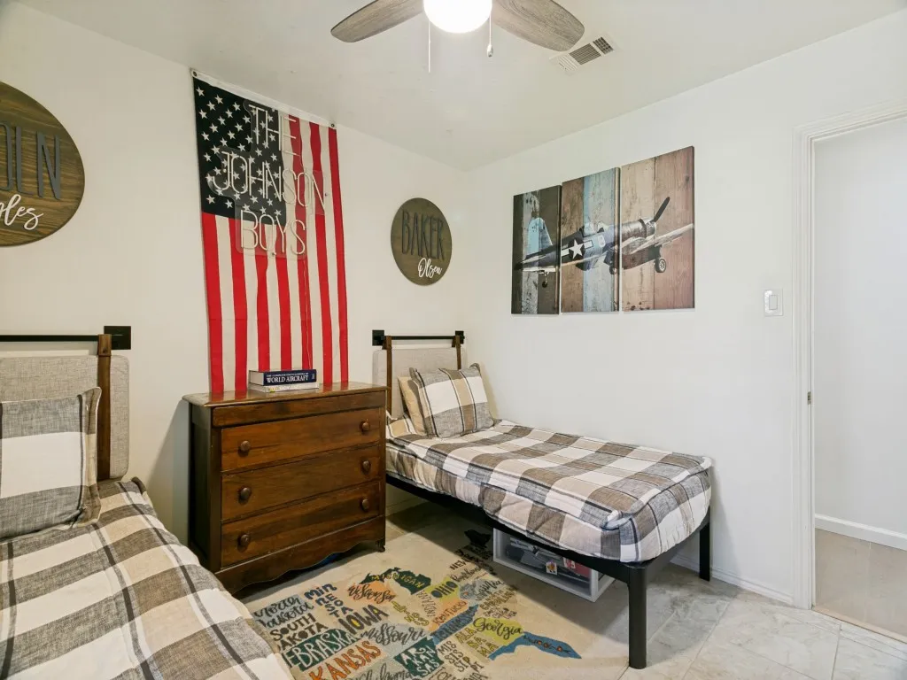 Bedroom 3 is another nicely sized secondary bedroom with tile flooring and no carpet.