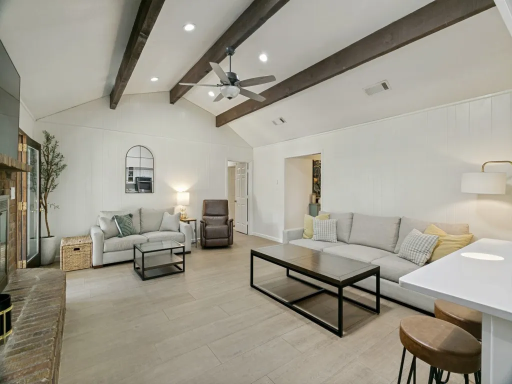 The living room opens directly to the kitchen and breakfast bar, keeping everyone connected.