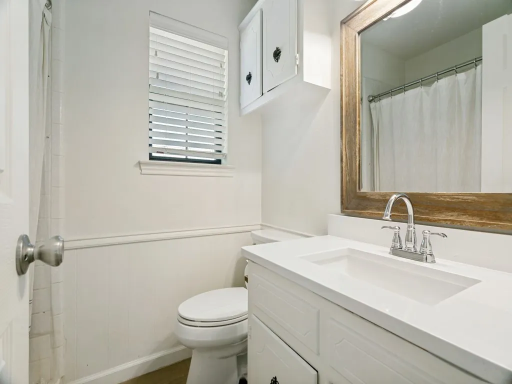 A third full bath adds valuable functionality to this versatile single-story floor plan.