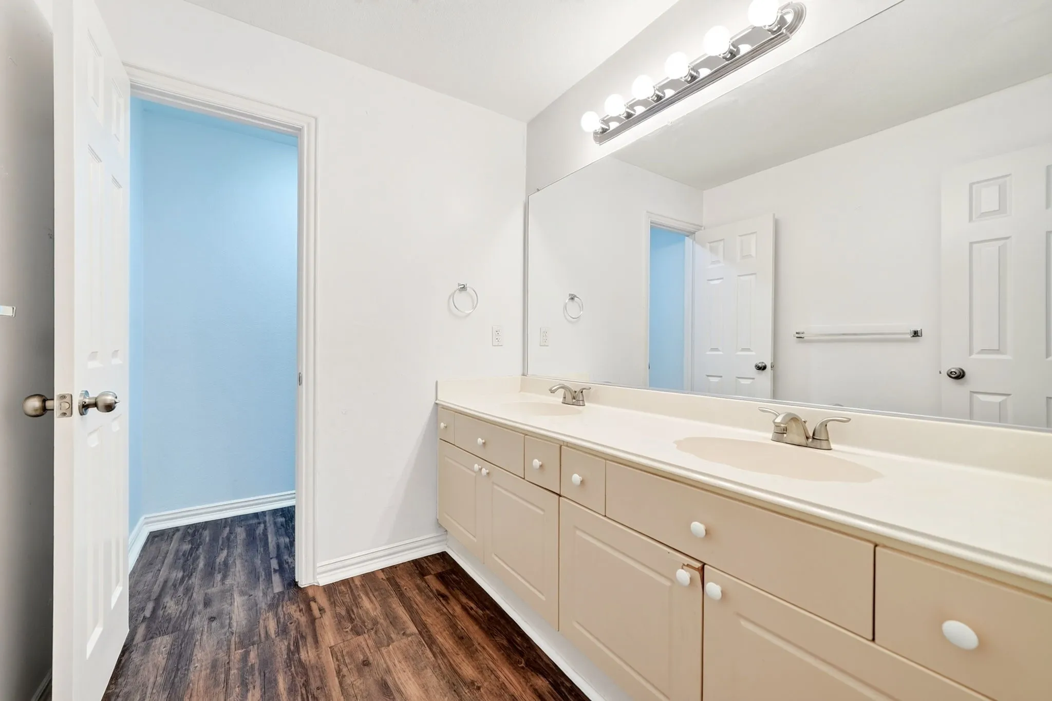 Full bathroom upstairs with bath tub and double vanity