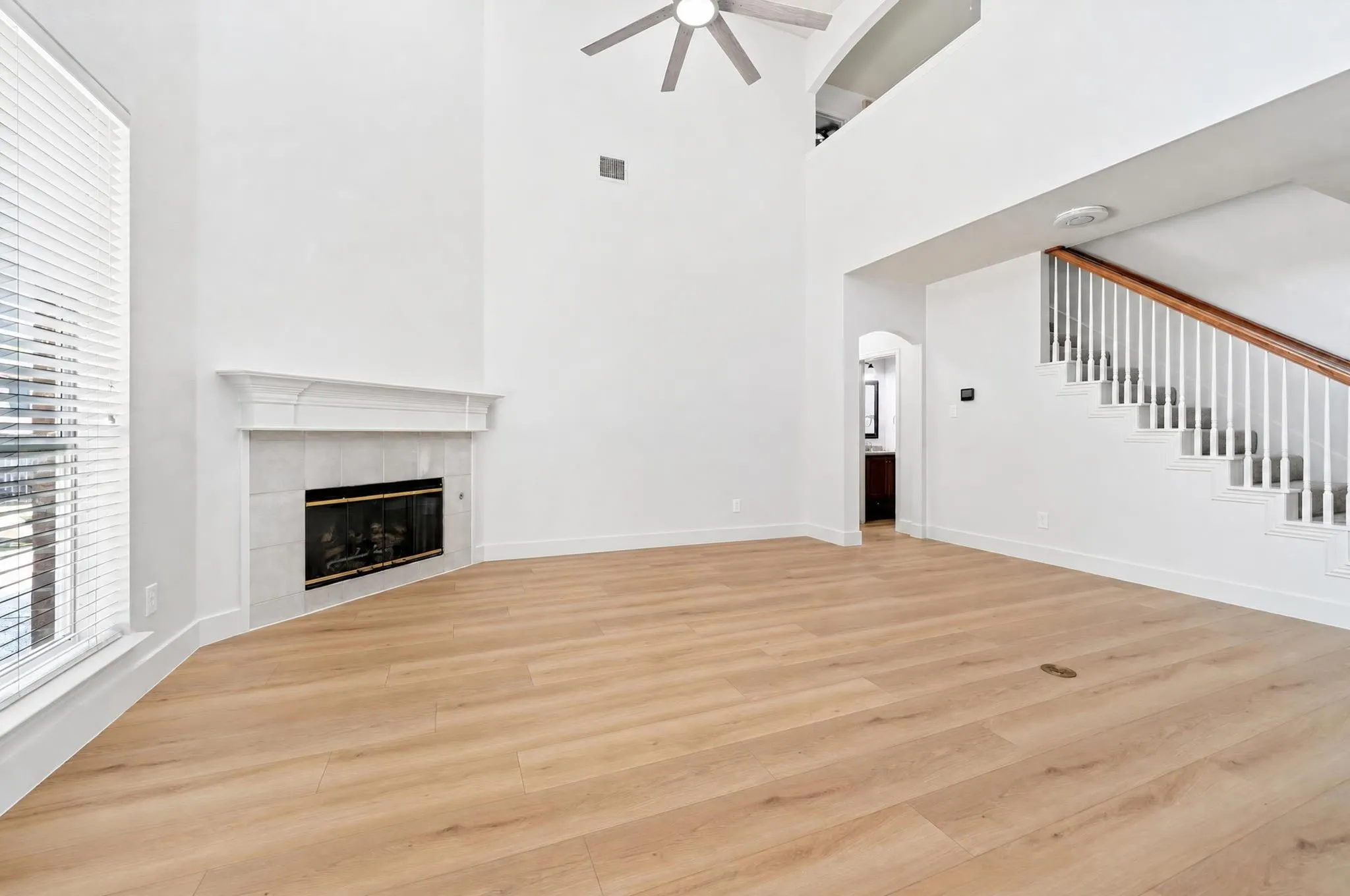 Gas fireplace and brand new, high-end laminate flooring.
