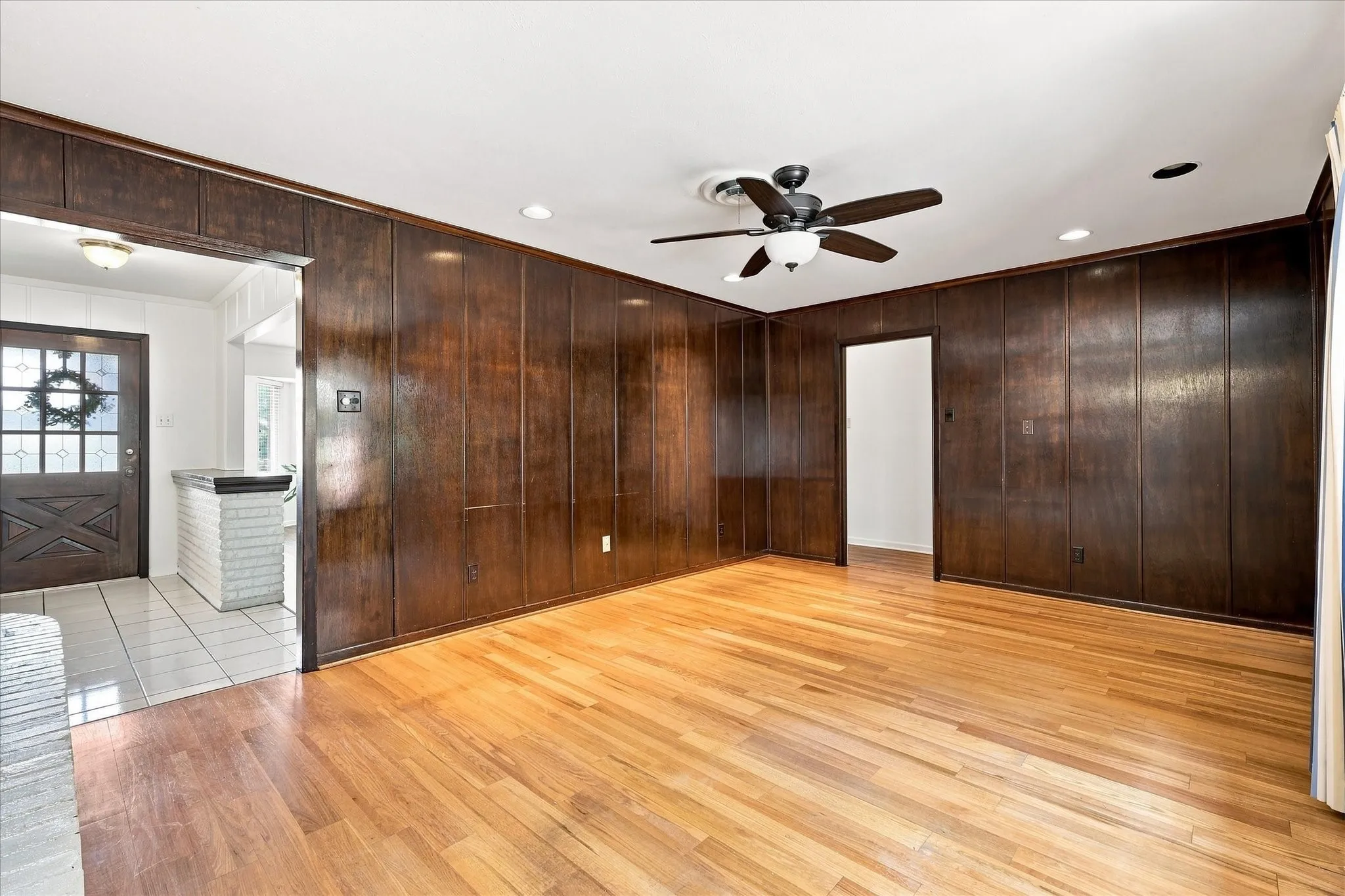 Spacious family room with built in fireplace.