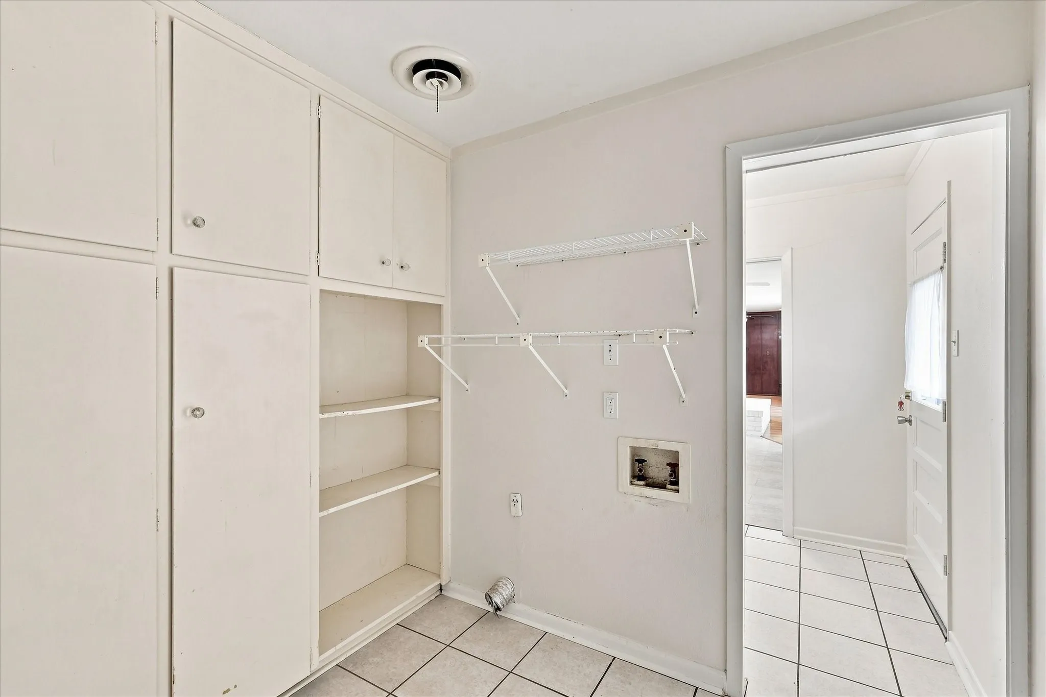Lots of storage in your Laundry Room right off the mud room.