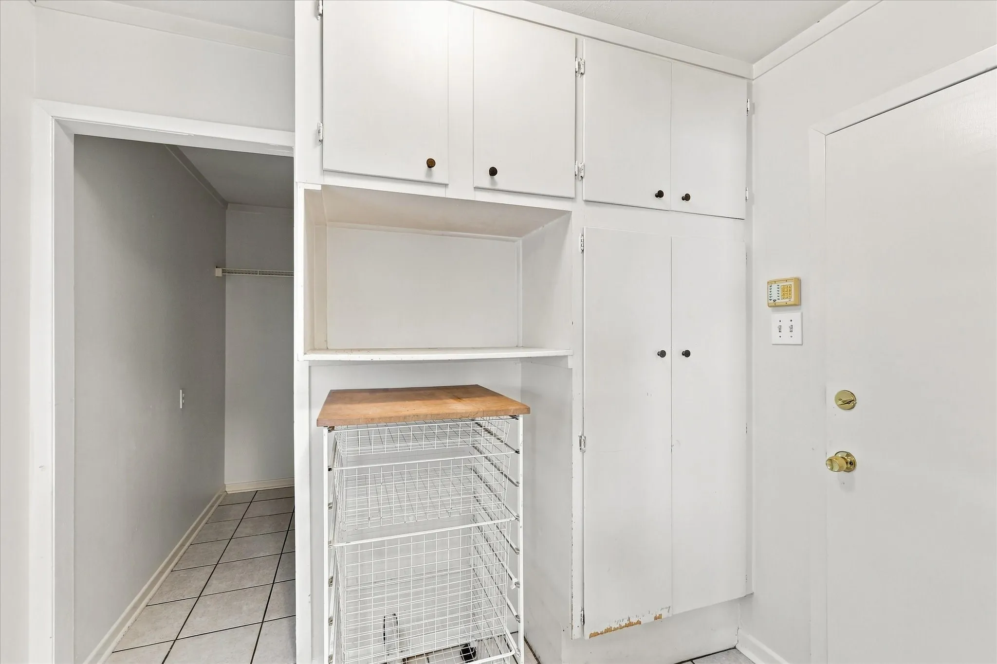 Walk in from the backyard or the garage into your very own mud room!