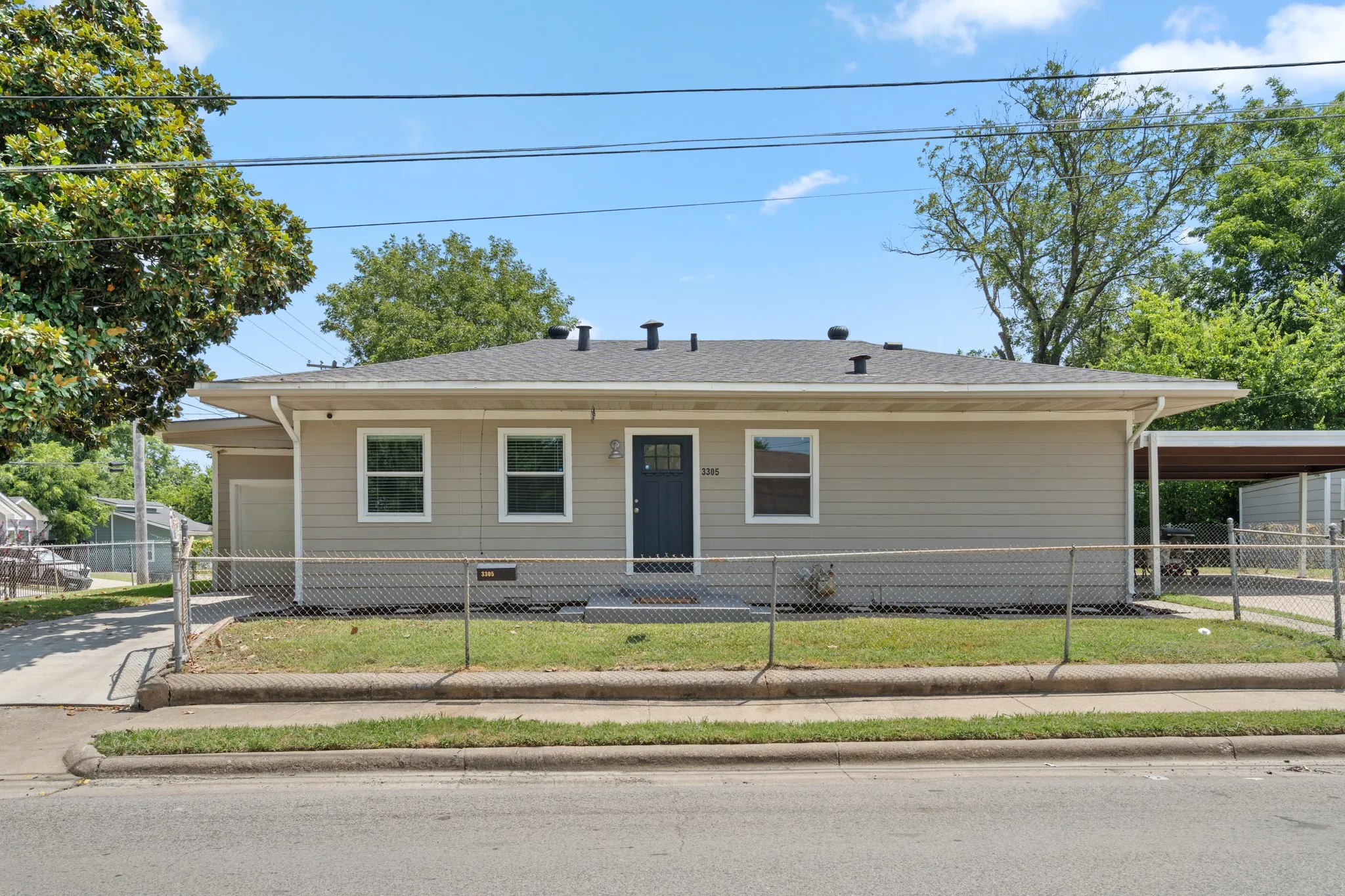 Corner Lot with dual driveways, sidewalks and walk-up appeal