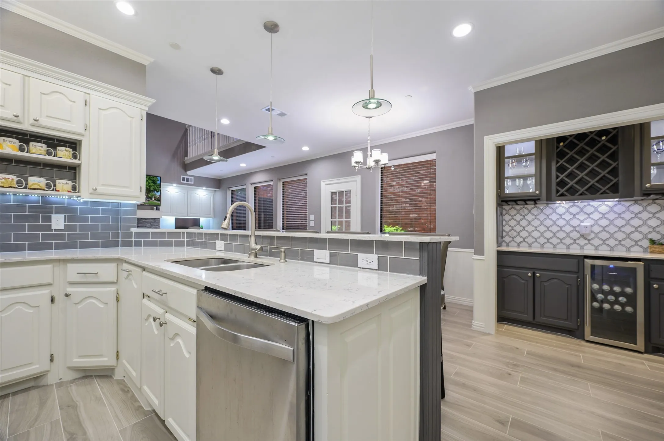 Kitchen overlooking breakfast room and living room