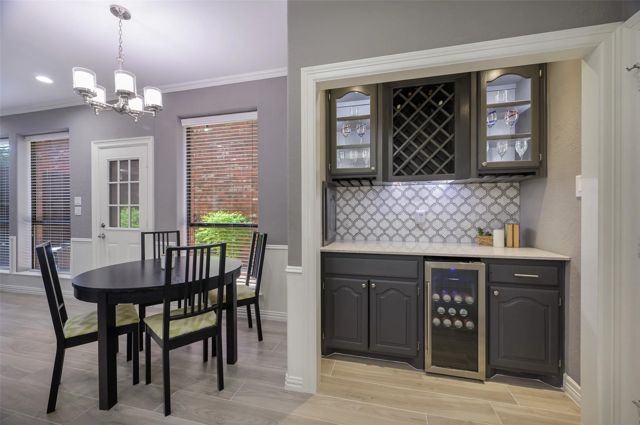 Dry bar in kitchen with wine frig