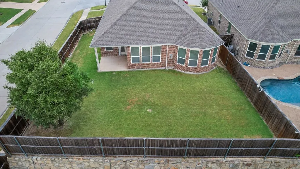 Huge backyard on corner lot! Spacious for a large swimming pool!