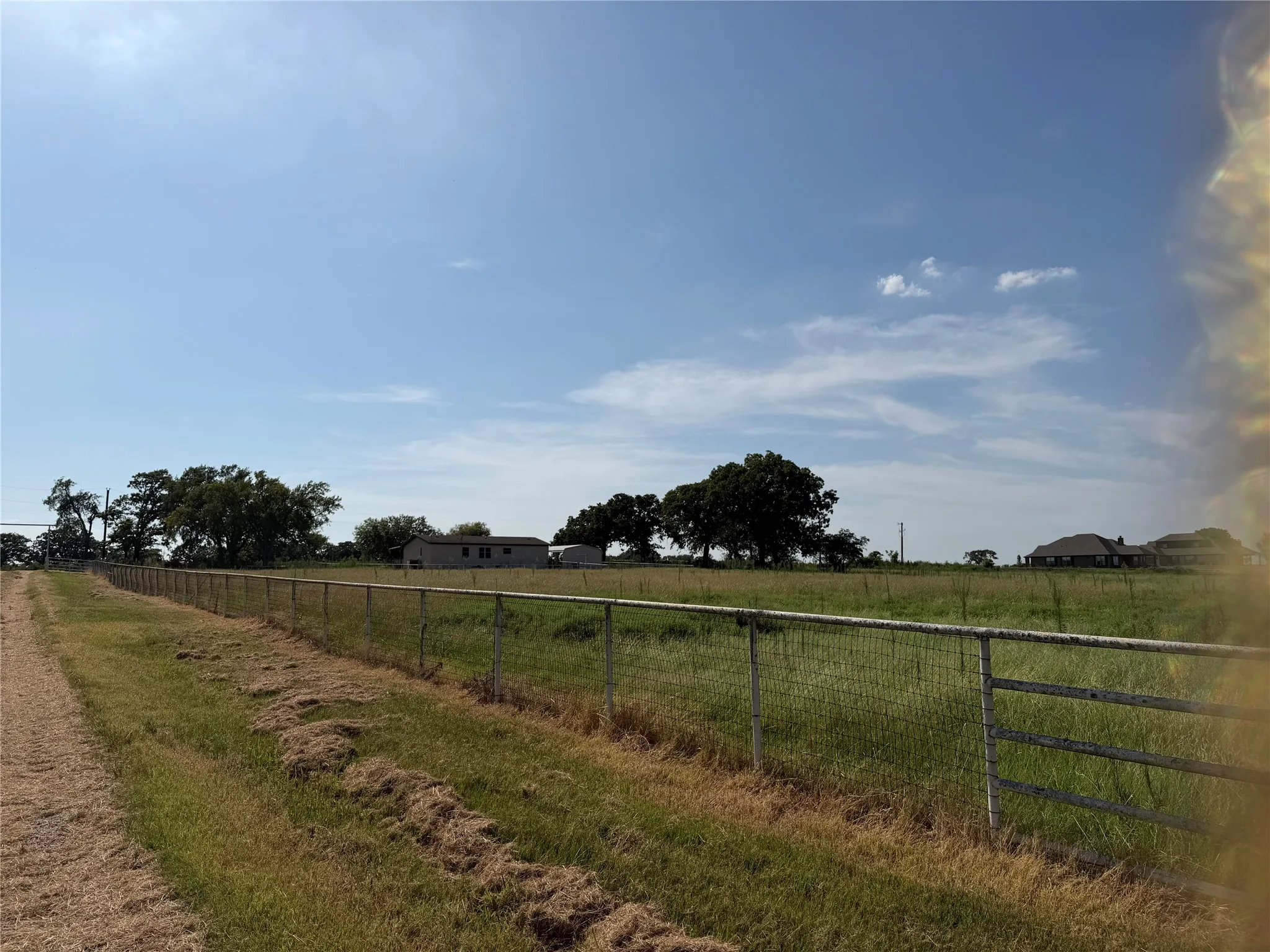 Looking south along the west pasture fence line.