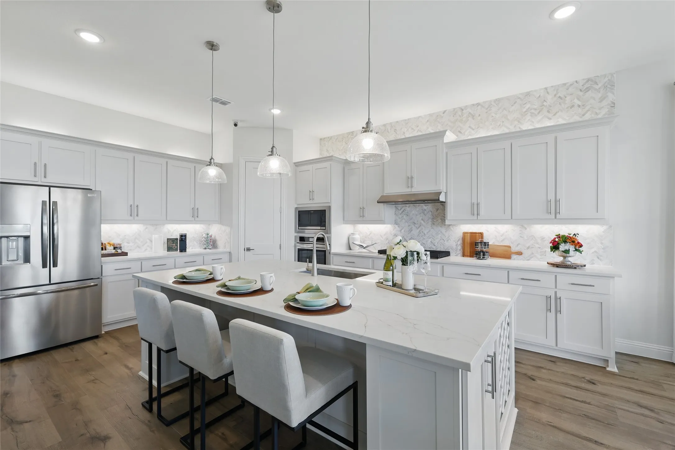 Model home photos of similar floorplans, not pictures of actual home.