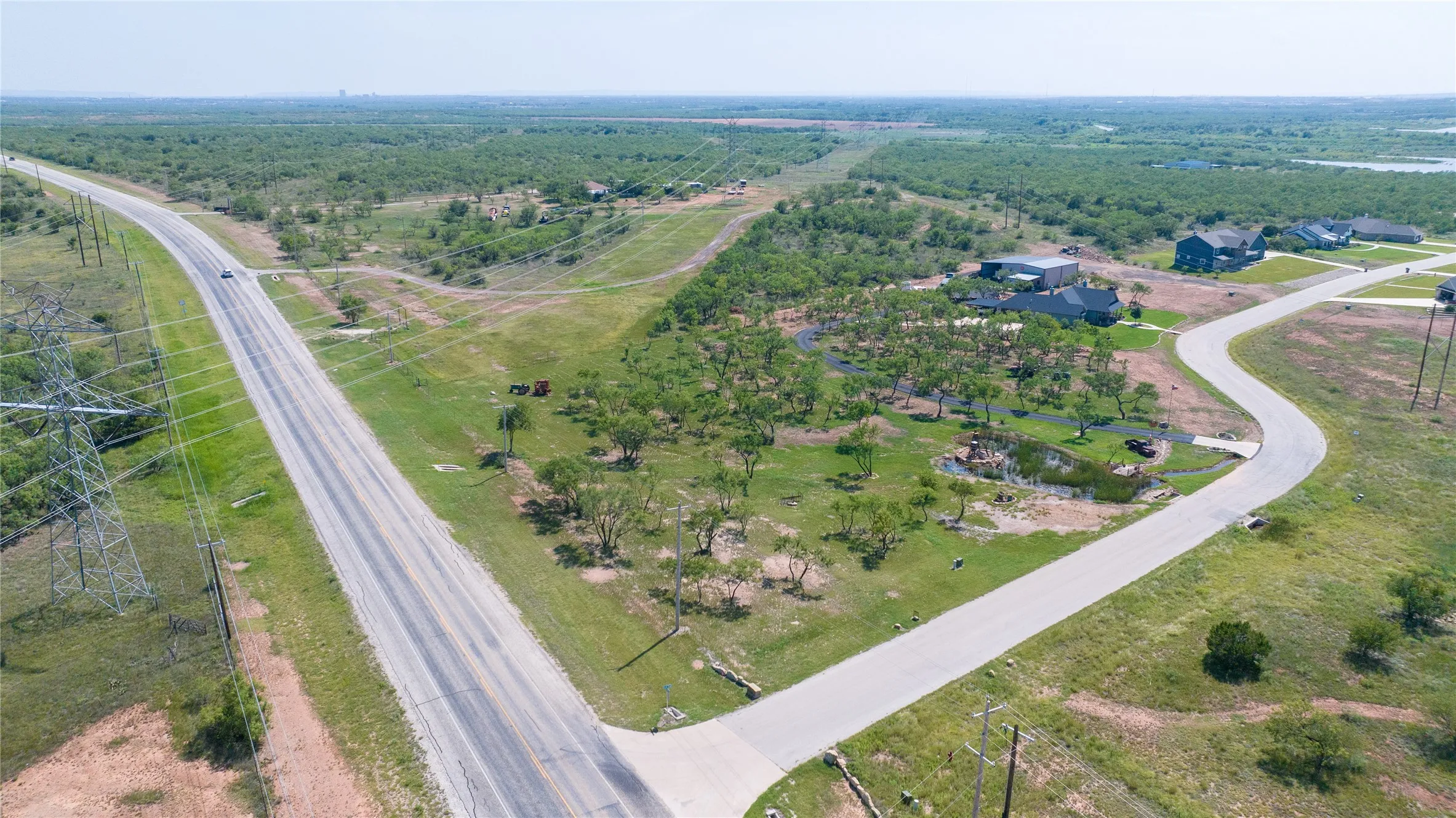 2.9 acres with lake views and gorgeous sunsets. Membership in a small HOA that maintains a pool and lake amenities.