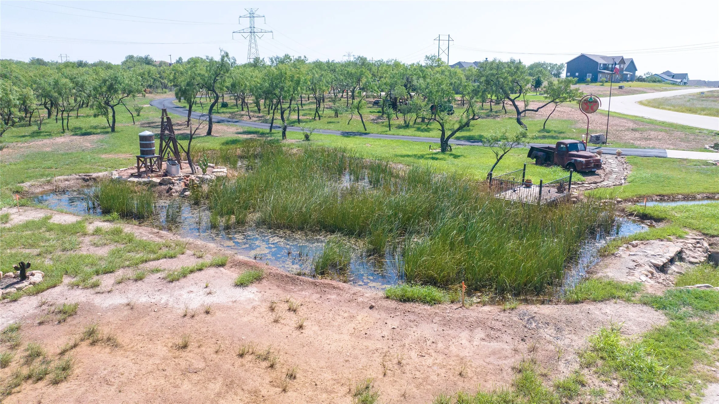 This pond has been cleaned out and new grass is growing all around it. Come check it out!