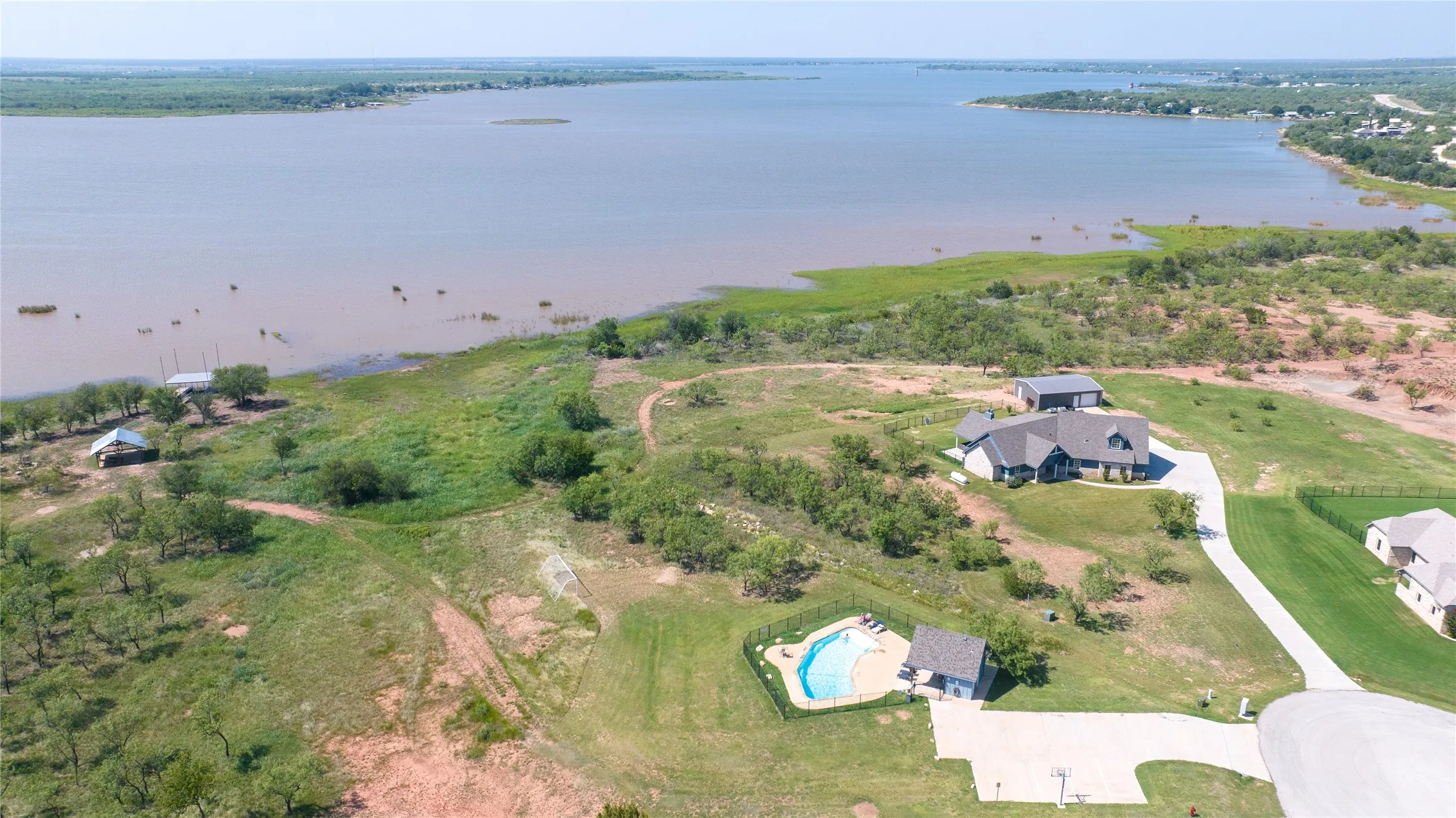 Community pool, lake access via dock.