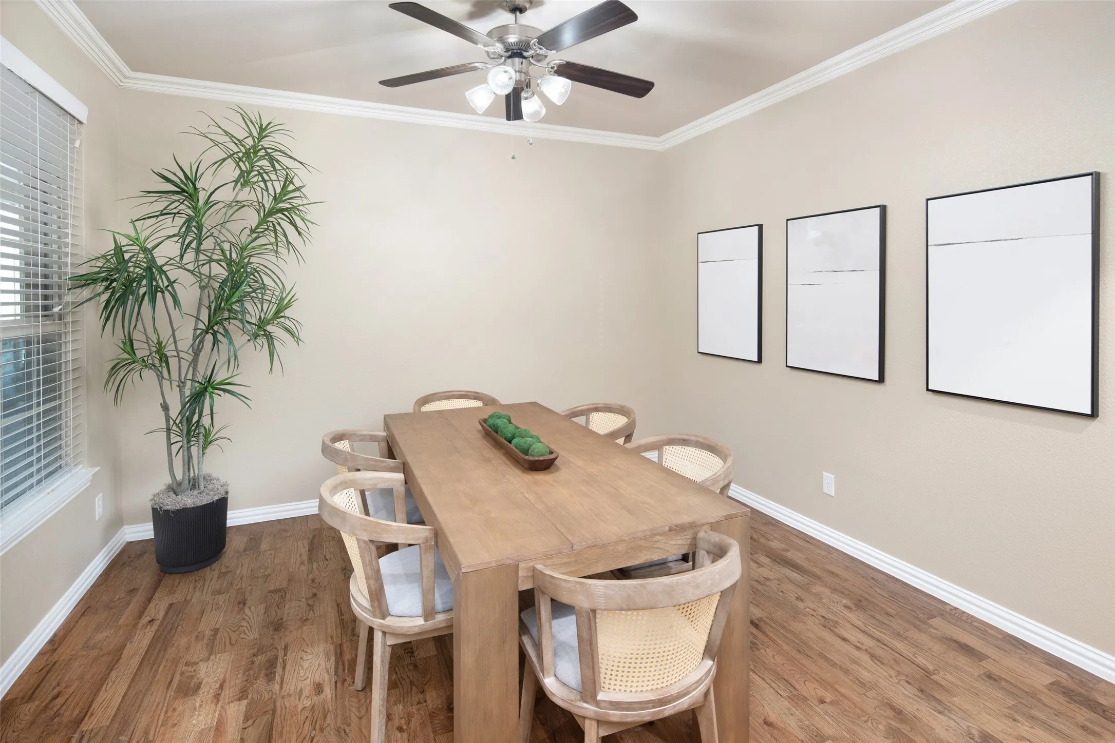 spacious dining room with ceiling fan