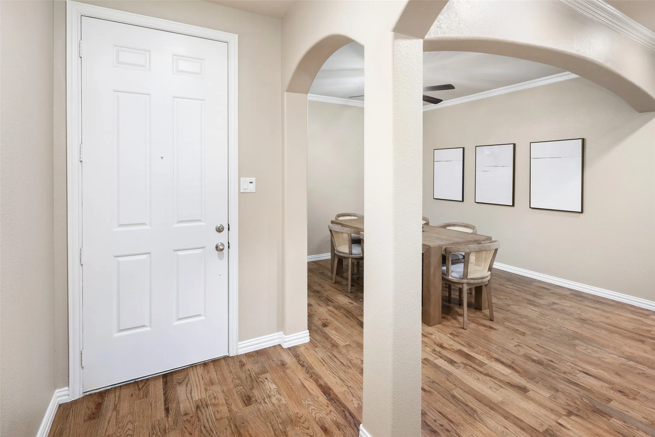 Dining room adjacent to the entry. Lots of room to expand the table for large gatherings.