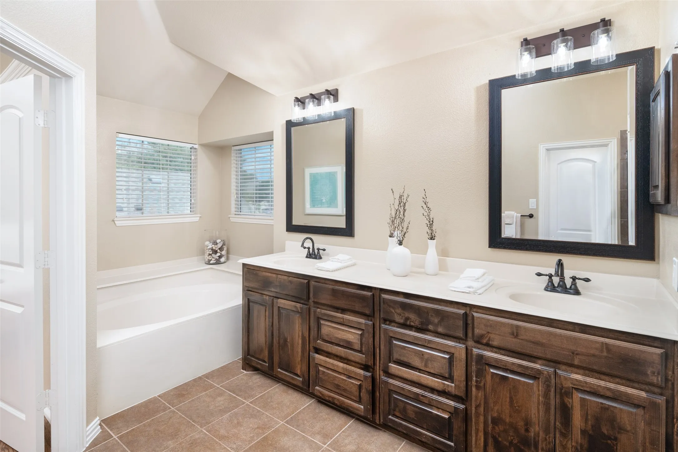 Primary bathroom also includes separate tub