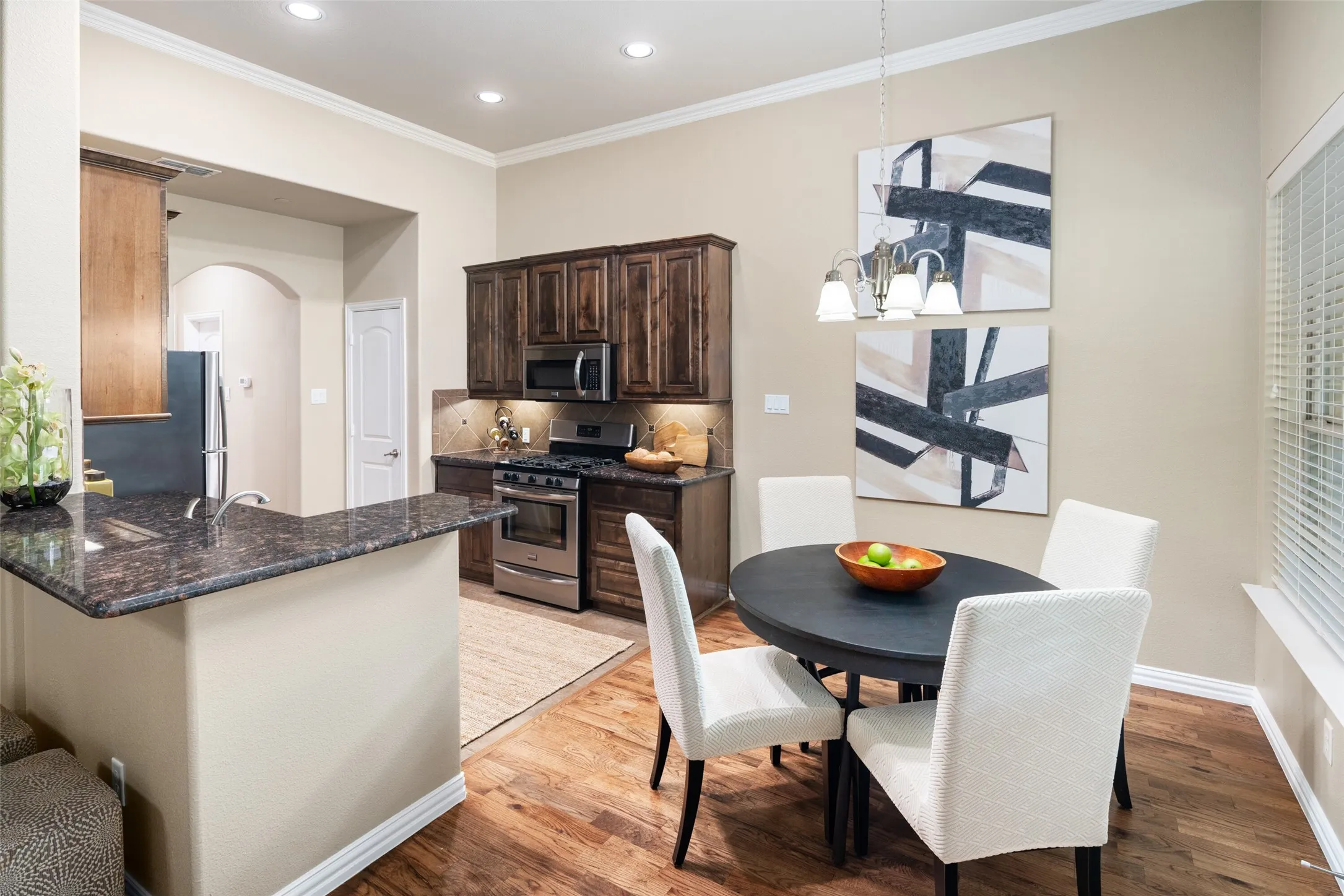 Granite countertops.  Also, hardwood floors throughout except for the wet areas. Wet areas have a neutral tile to compliment many different color schemes