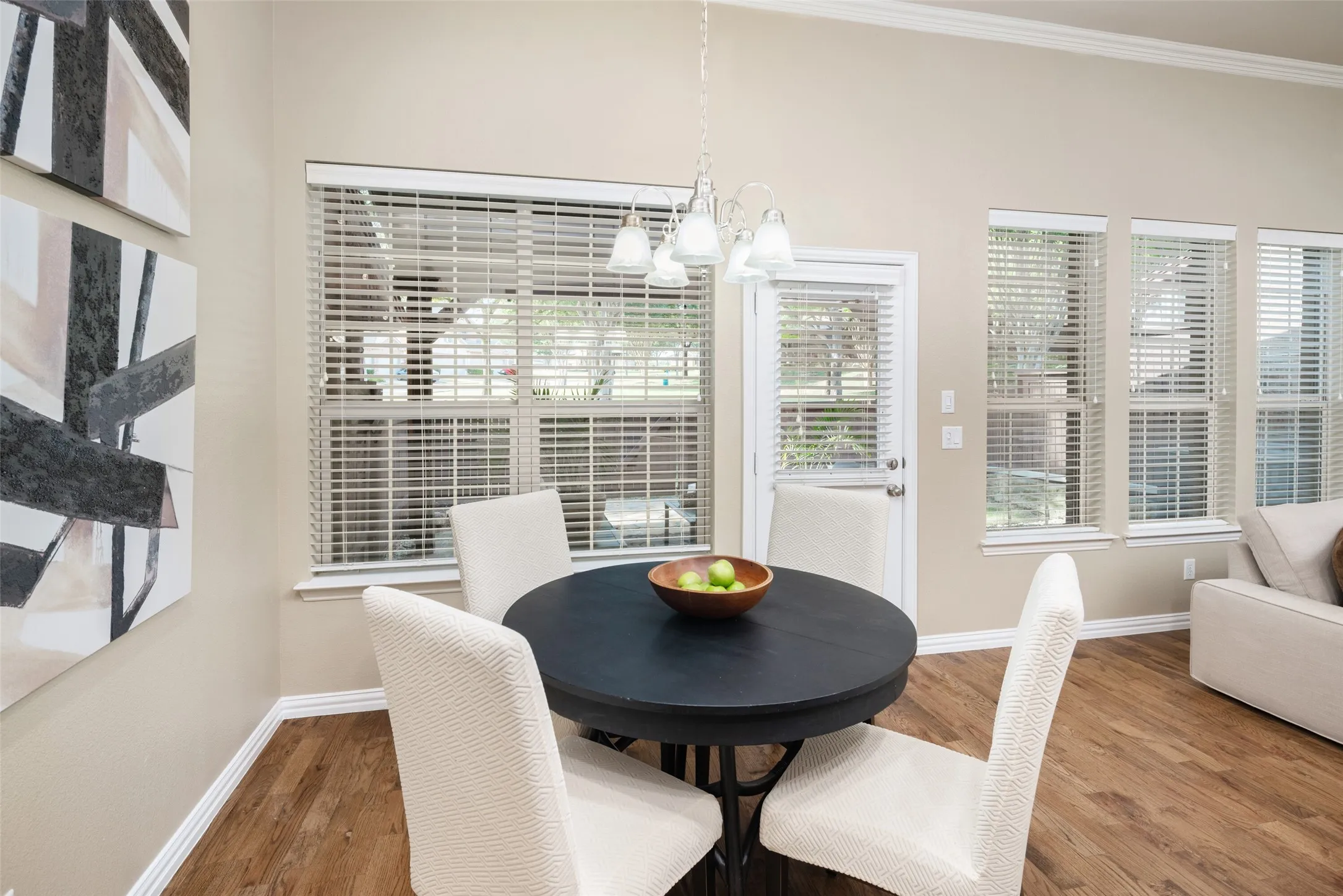 Breakfast room opens to kitchen and family room.  Views of the back yard and a large open greenspace beyond