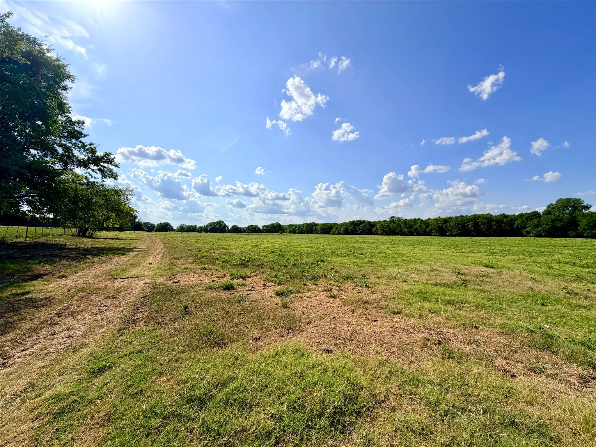 Second entrance off CR 2130 with lean to, cattle pen and multiple gates