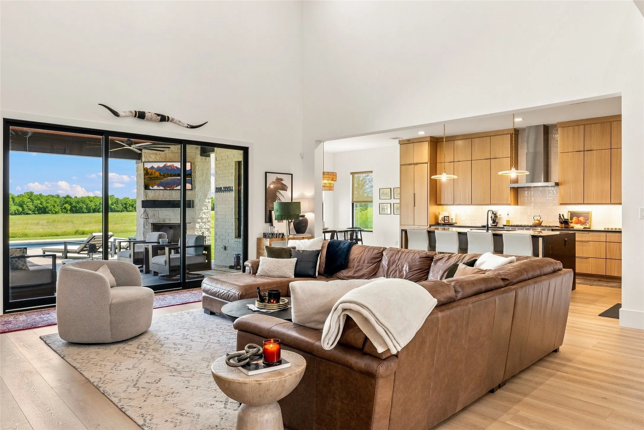 Soaring two-story ceiling and expansive LVP flooring