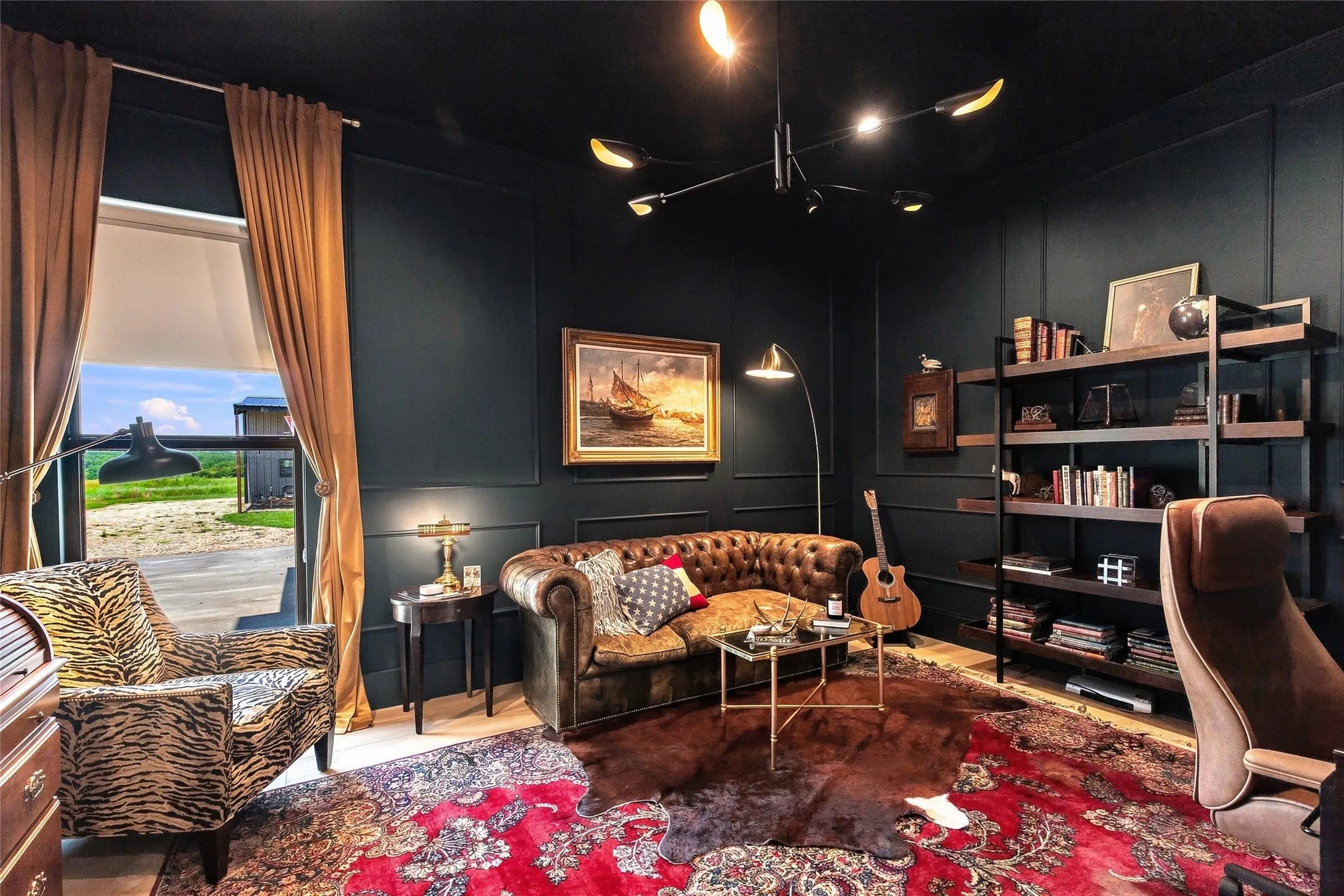 Deep-toned picture frame trimmed walls  featuring a modern multi-light ceiling fixture