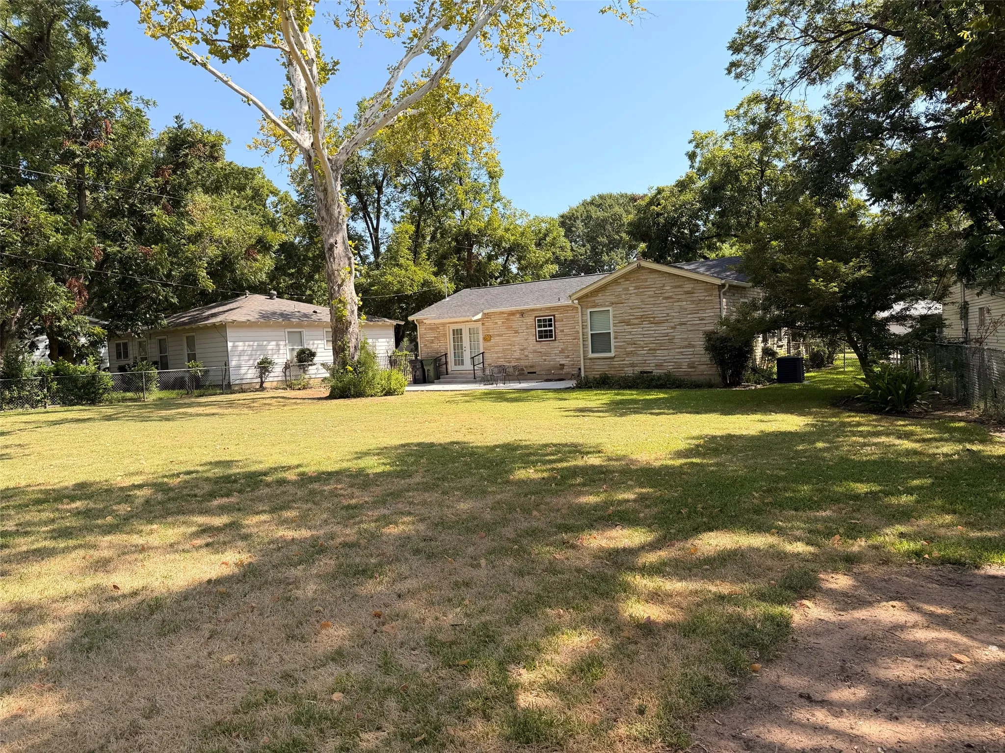 Massive backyard.  Homesite measures approximately 96 feet wide and 165 feet deep.  This is like getting two backyards.  Great for your organic garden or outdoor sports and activities.