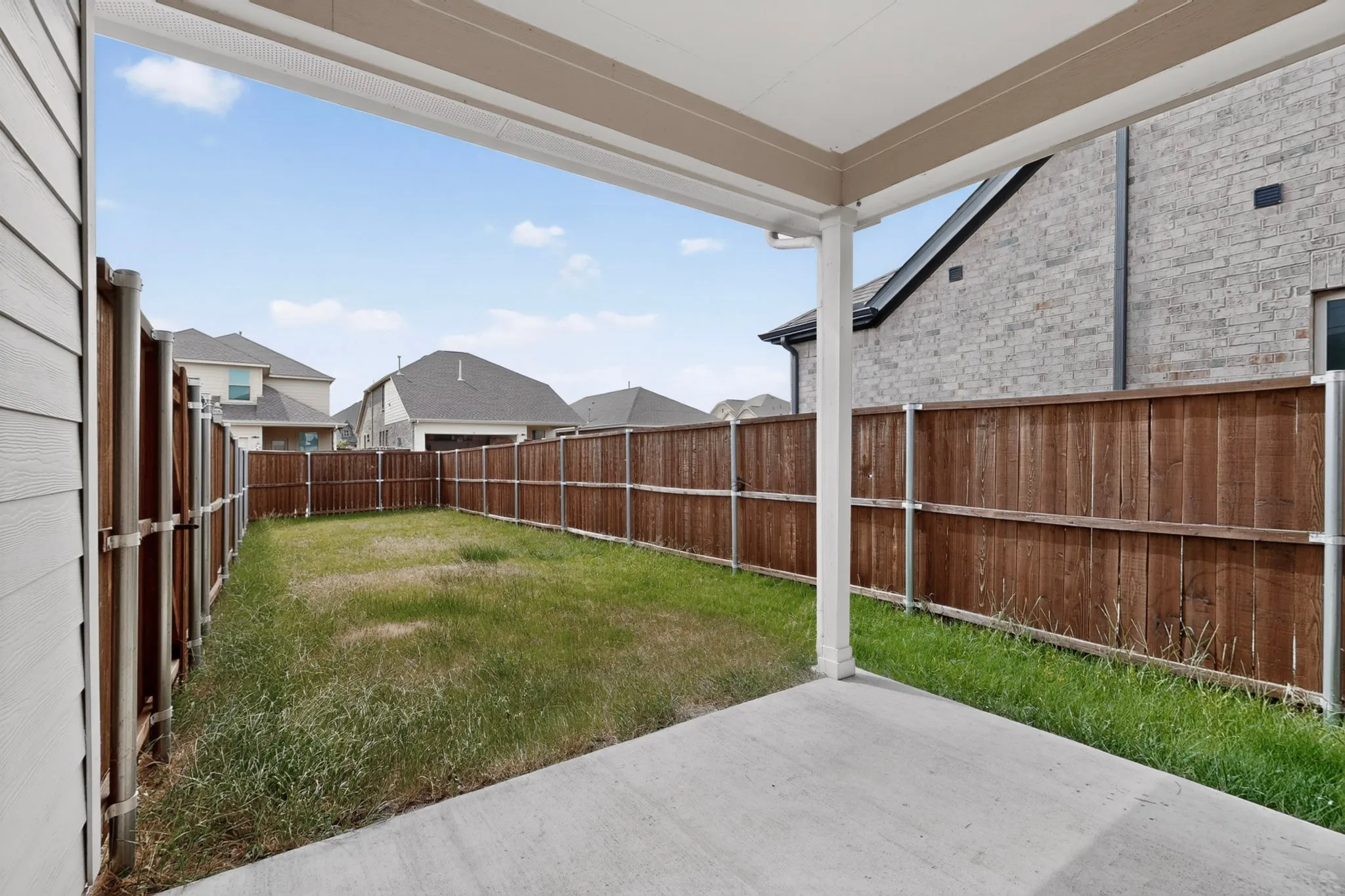 Covered patio featuring a concrete surface