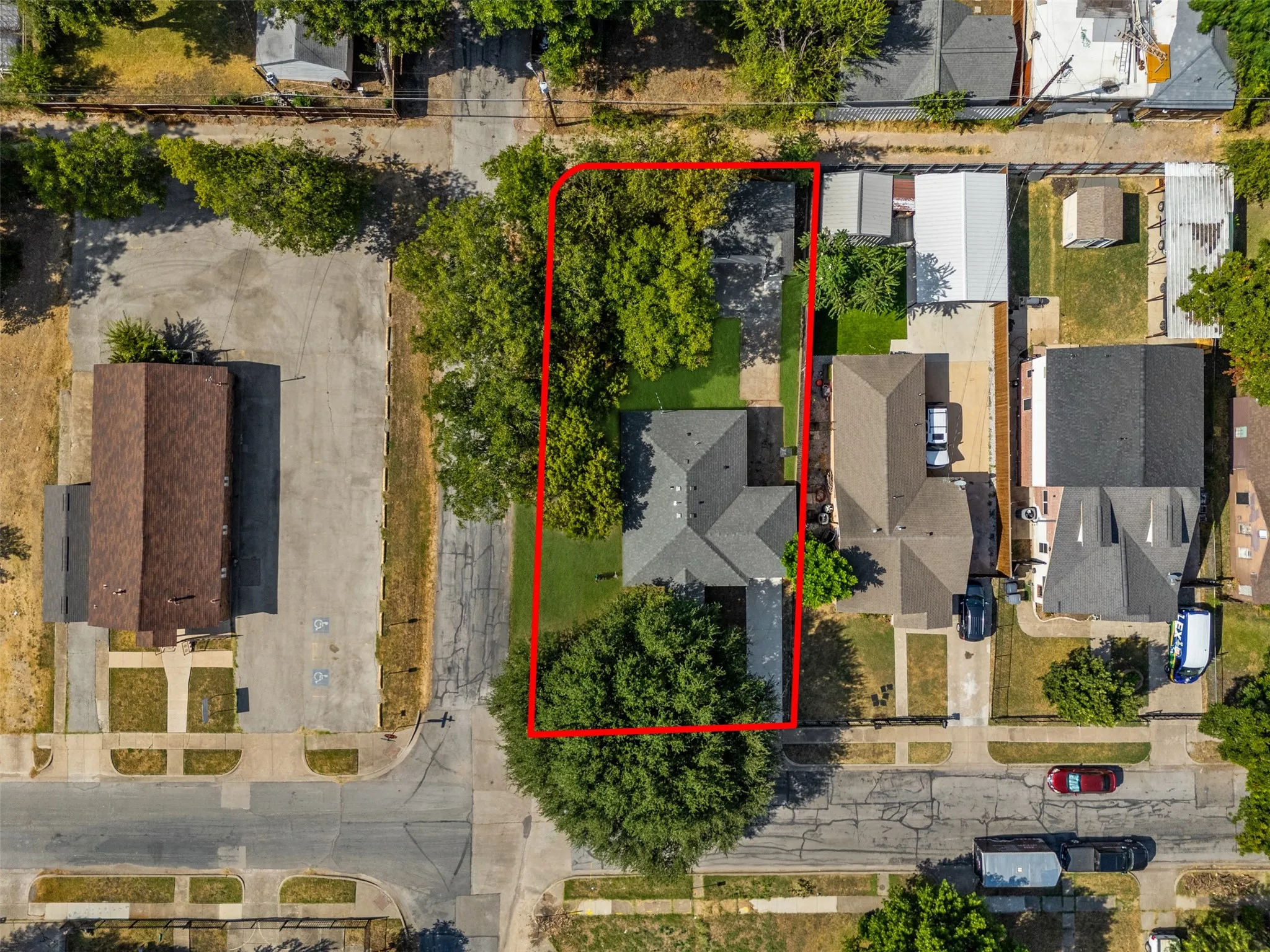Aerial perspective showcasing the property's lot size and surrounding neighborhood