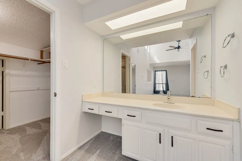 Spacious vanity with an integrated sink and ample counter space