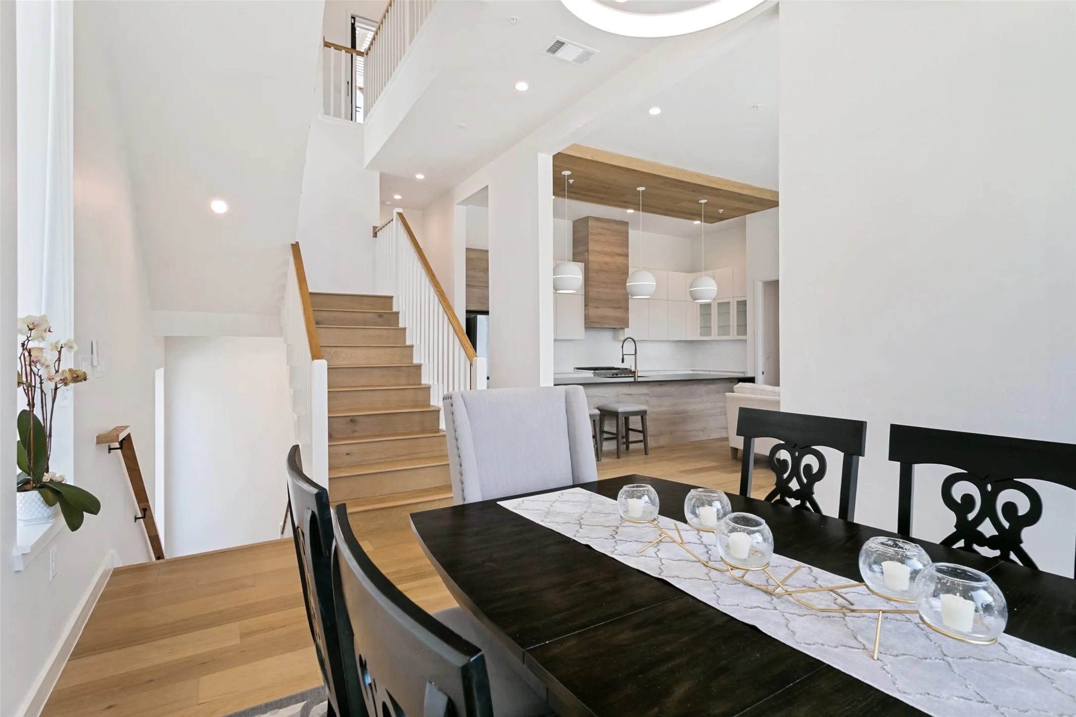 Open dining room with easy access to living room and kitchen.