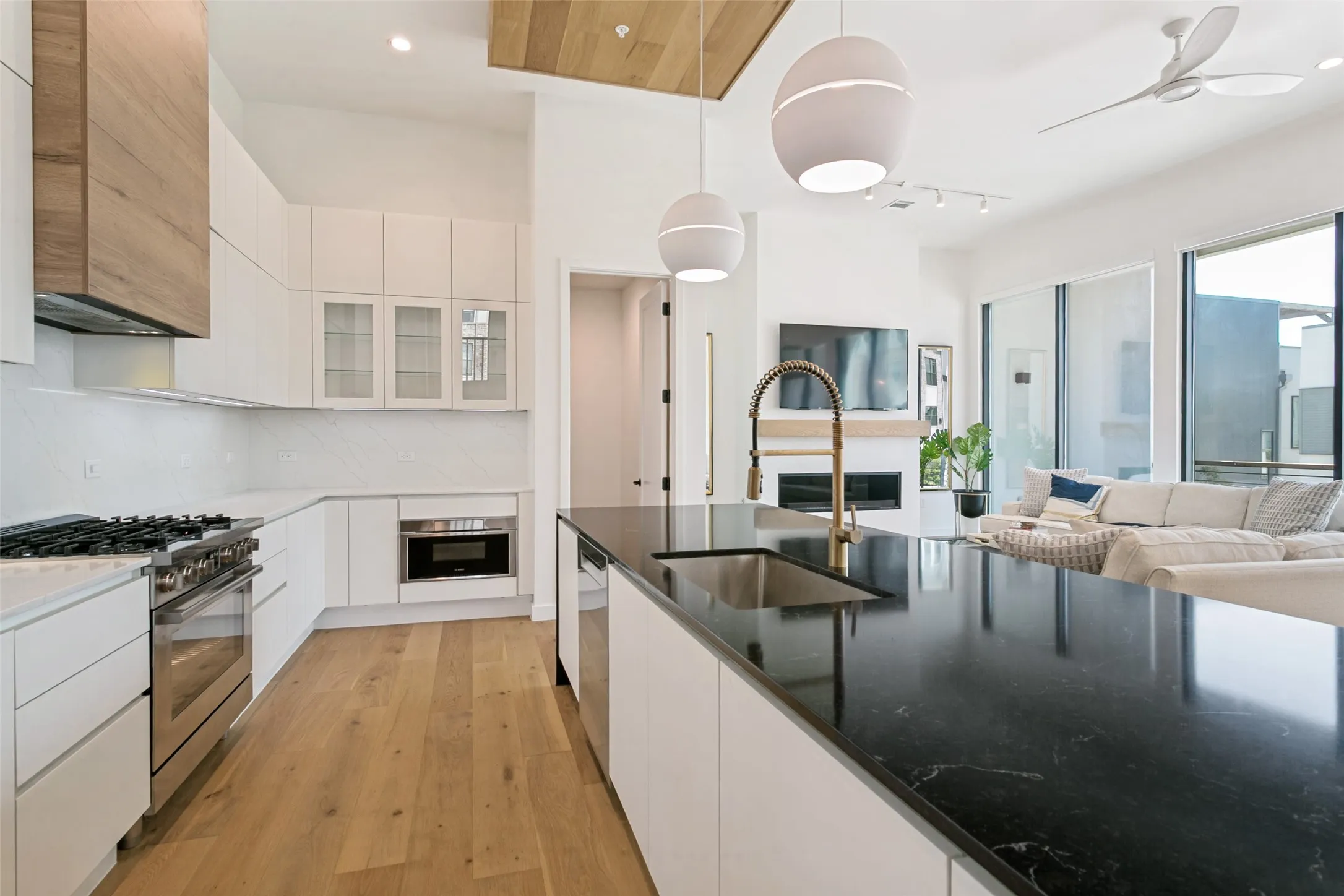 Gourmet kitchen designed for effortless entertaining, featuring upscale finishes, generous storage, and a spacious walk-in pantry.