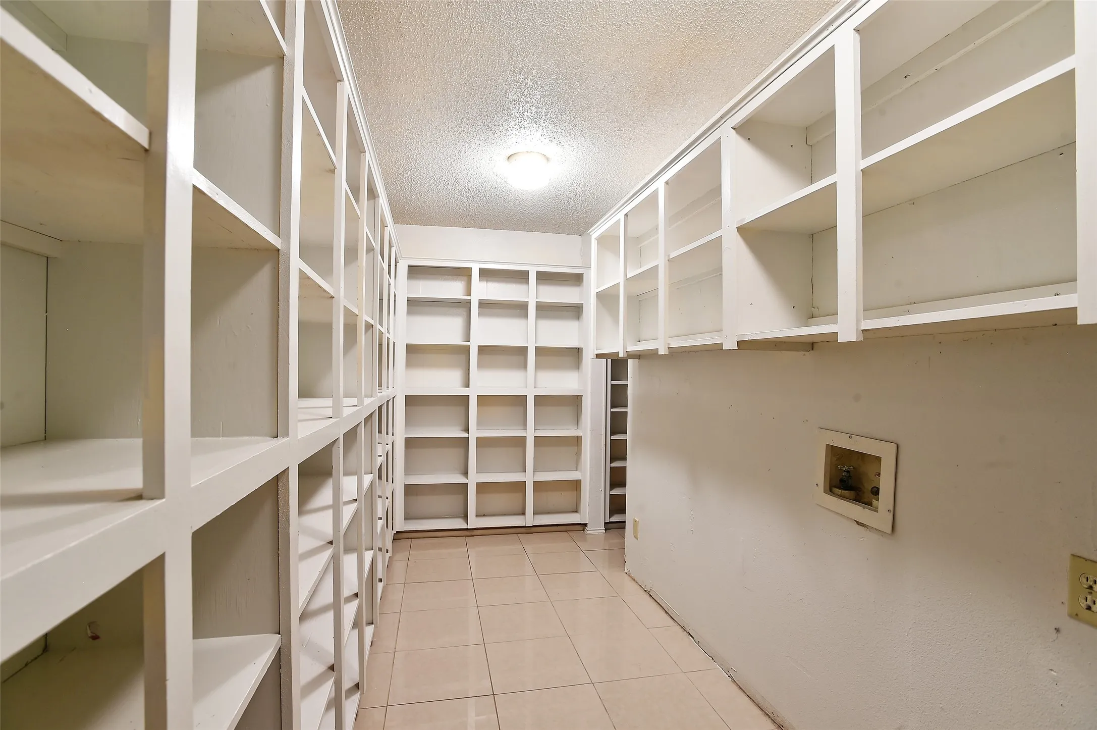 Pantry and laundry room.  The storage space in this home is unbelievable.