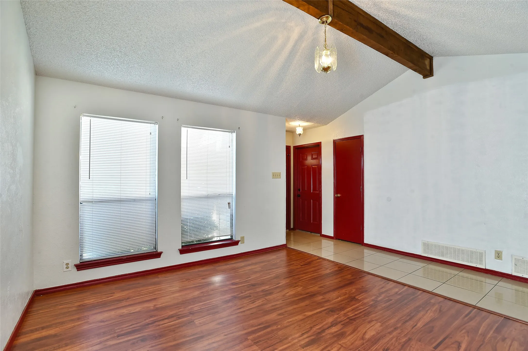 The windows open up to the front yard.  The door to the left leads to the garage.