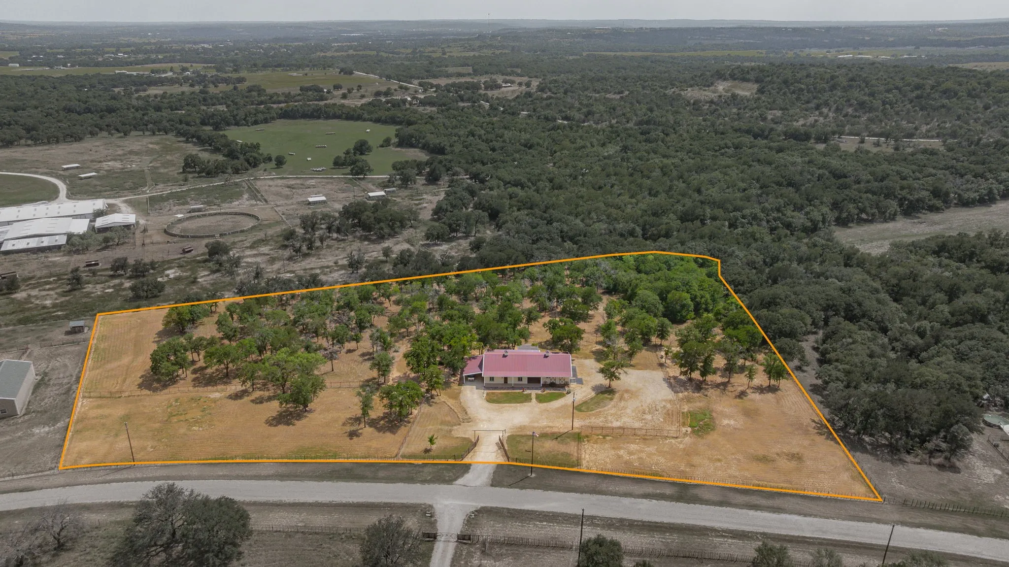 2 fenced pastures in front of property and fenced pasture in back of property.