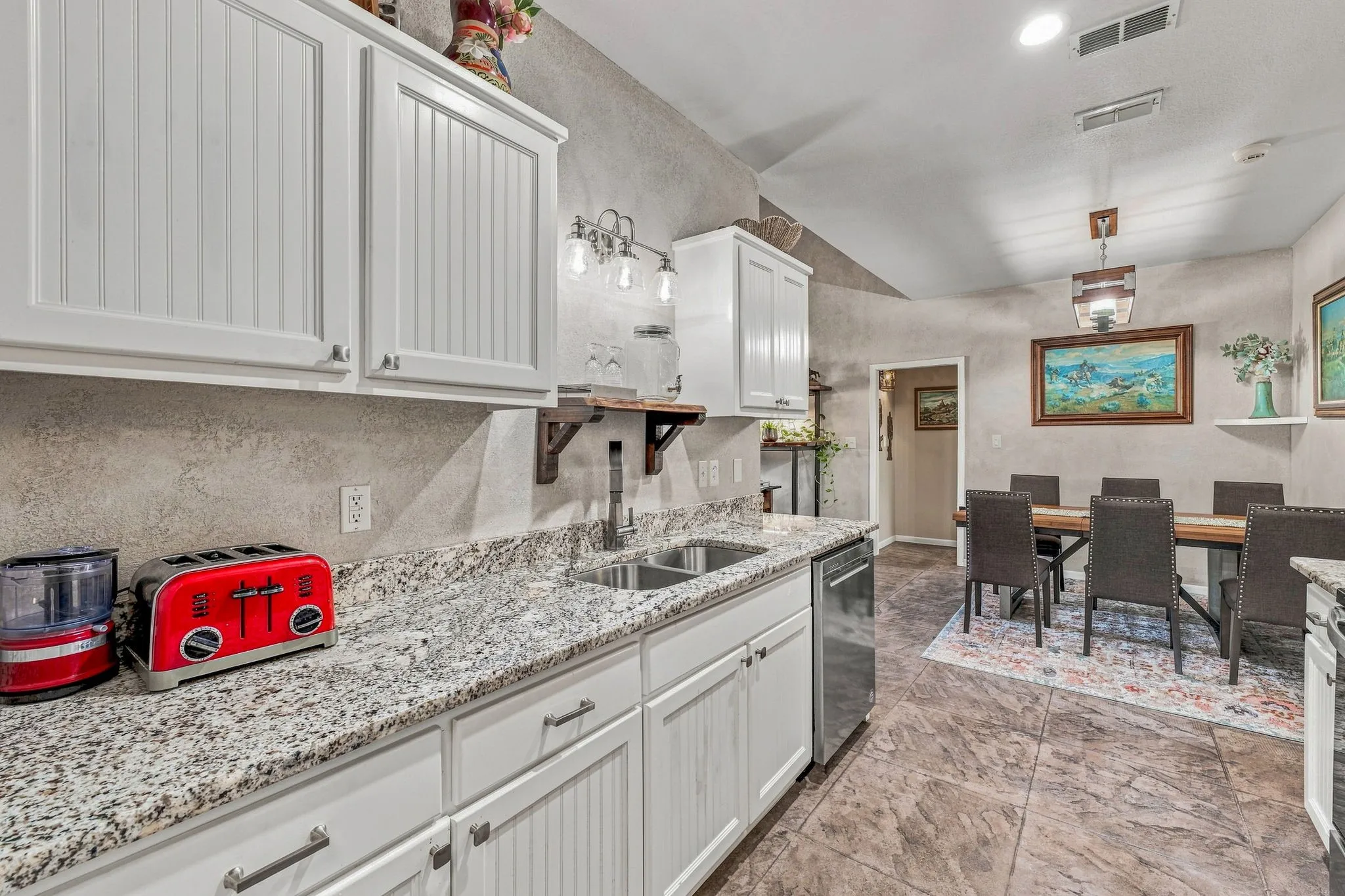 Granite countertops.  SS Whirlpool appliances