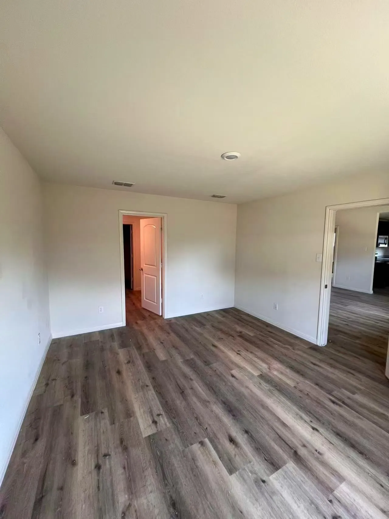 Wood-finish flooring throughout