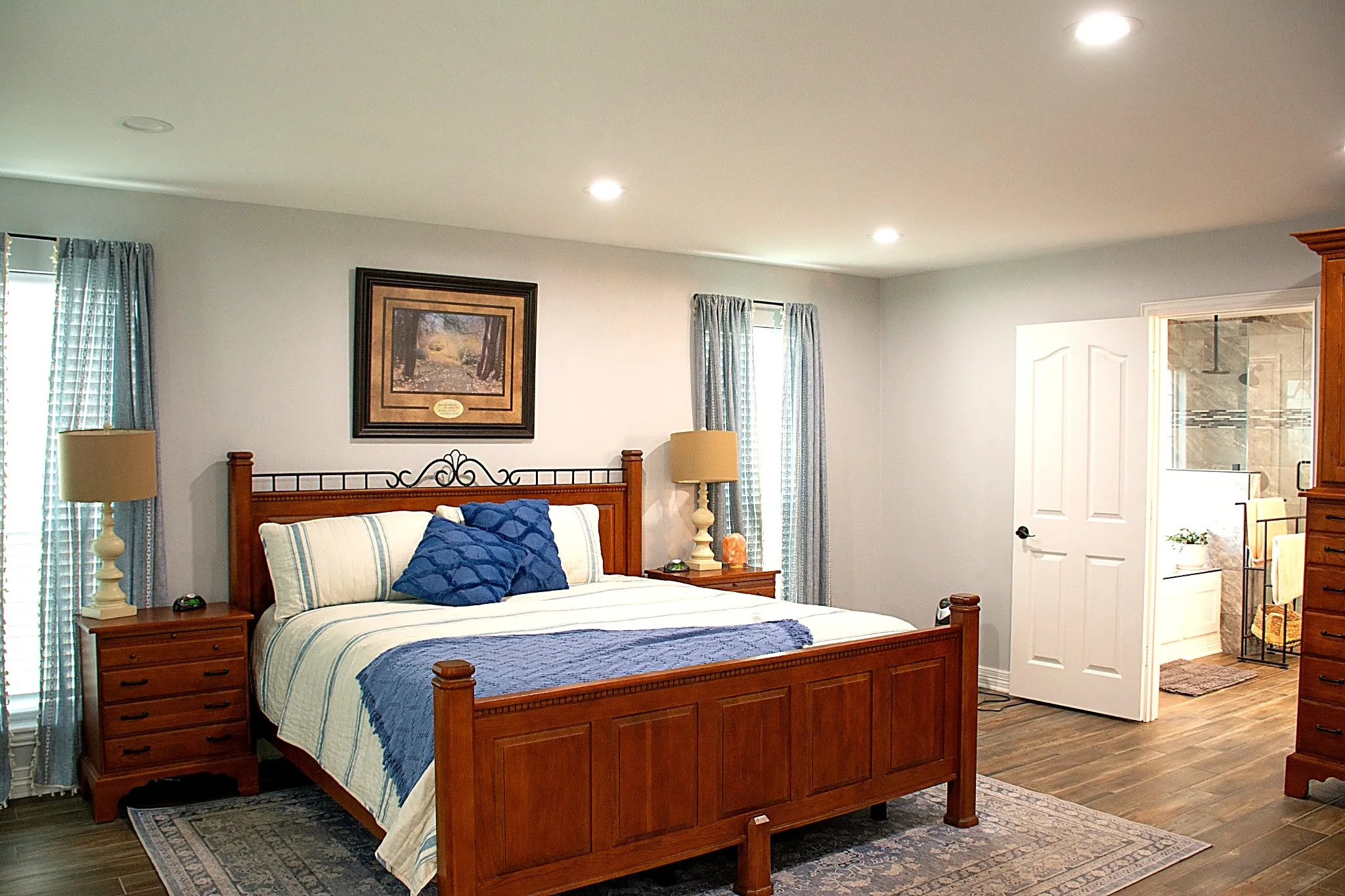 Primary has plenty of room for King bed. Recessed lighting, white paneled doors
