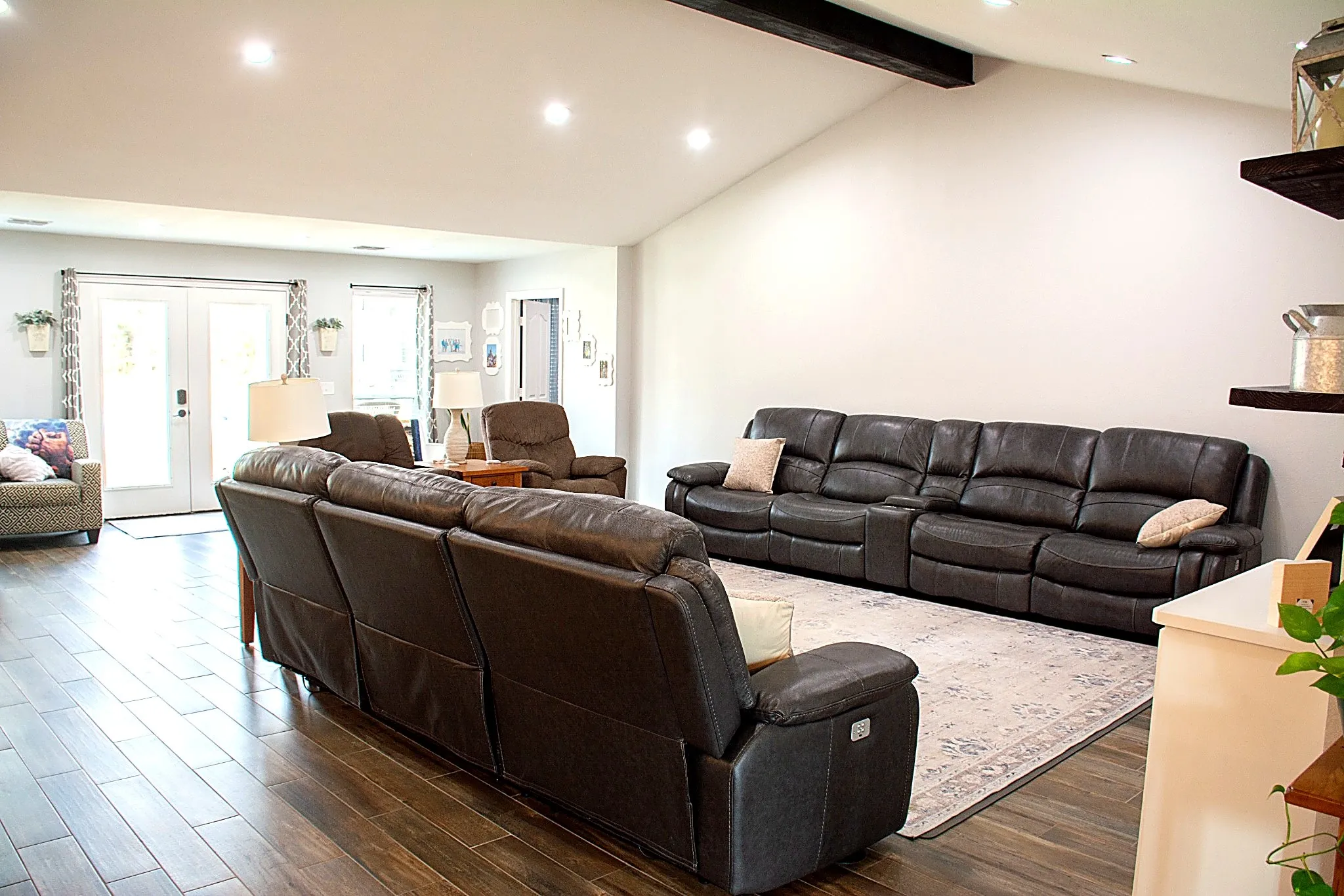 Family room with double French doors and windows