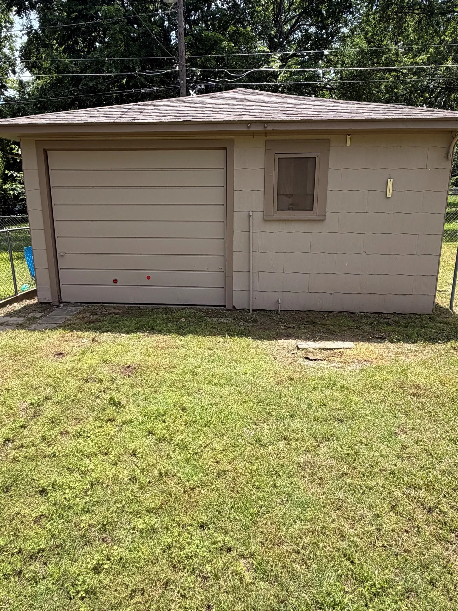 Detached Garage. Door access on the right side