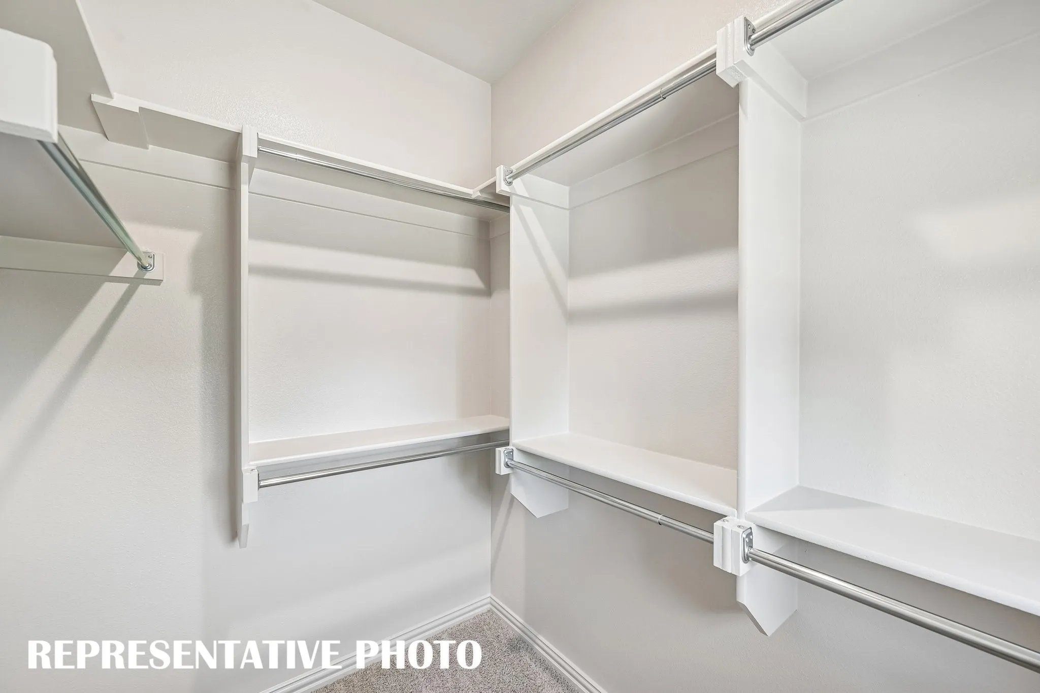Plenty of hanging space in this dream owner's closet!  REPRESENTATIVE PHOTO