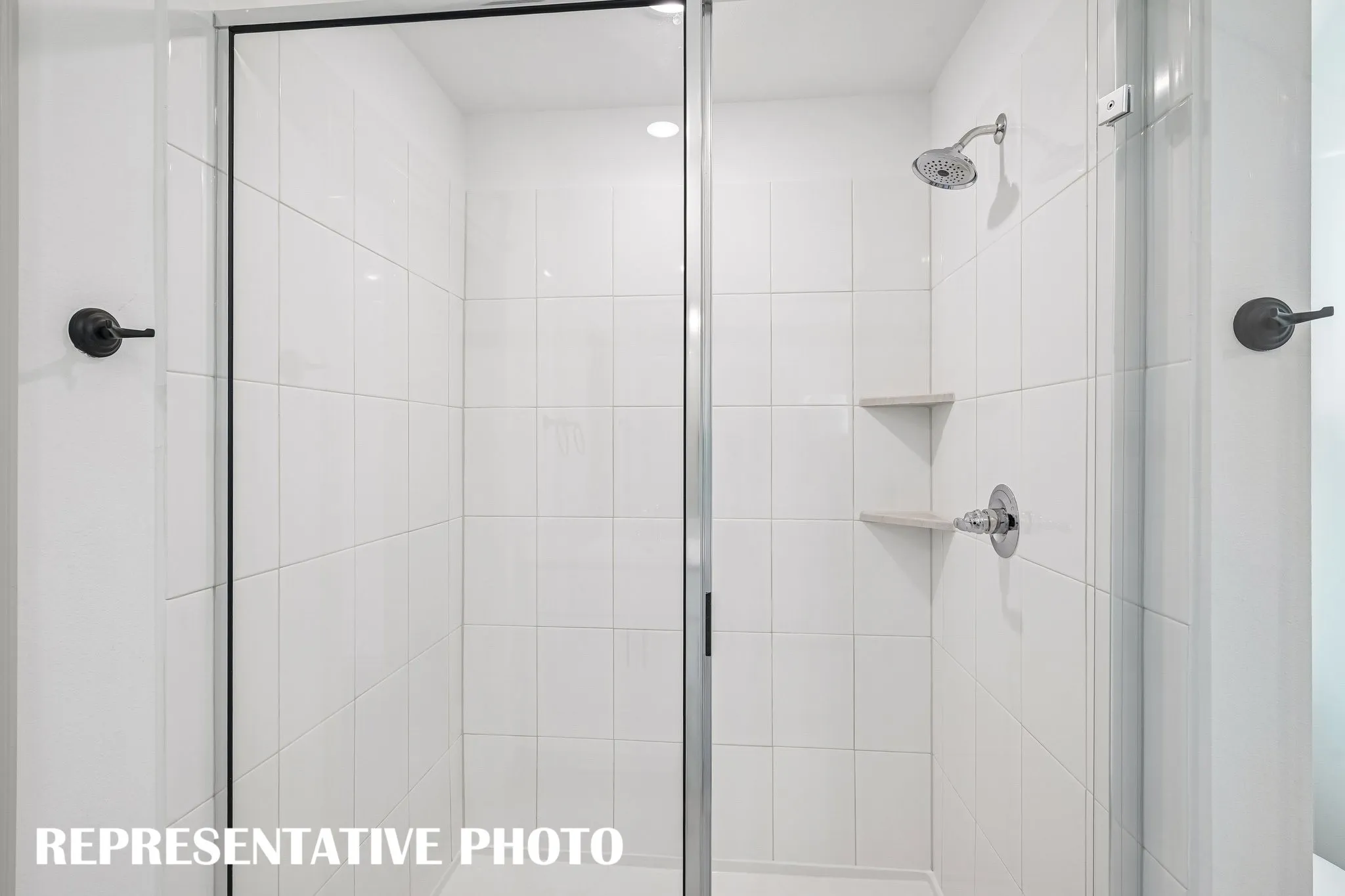 You'll enjoy a large walk in shower when you call this owner's bath your own!  REPRESENTATIVE PHOTO