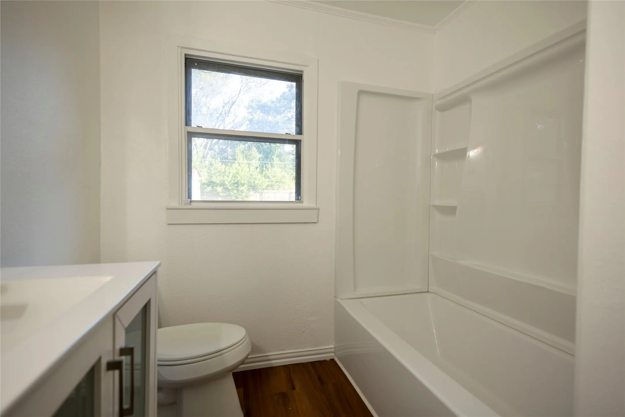 White single vanity with integrated sink