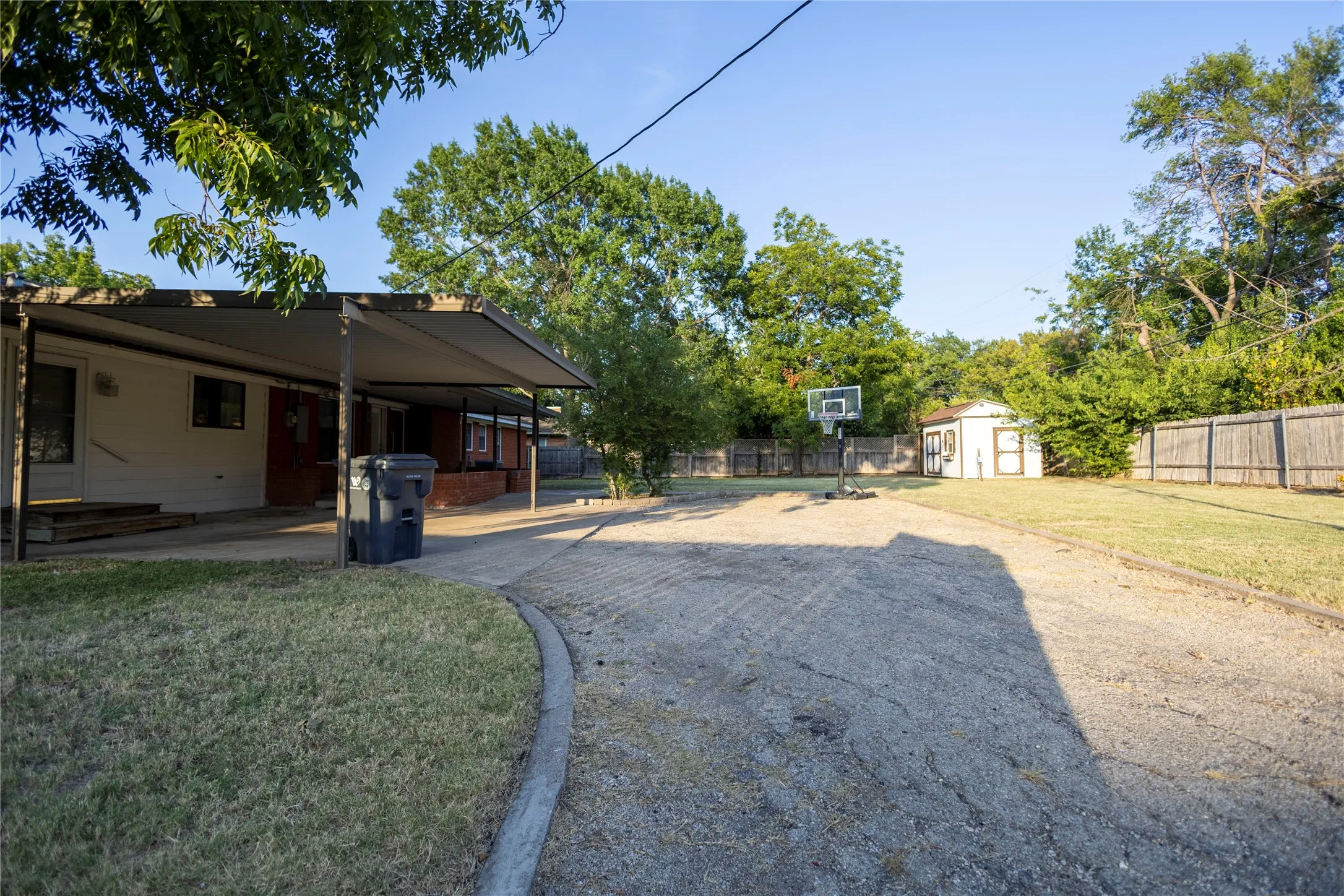 Covered patio extending across the rear elevation