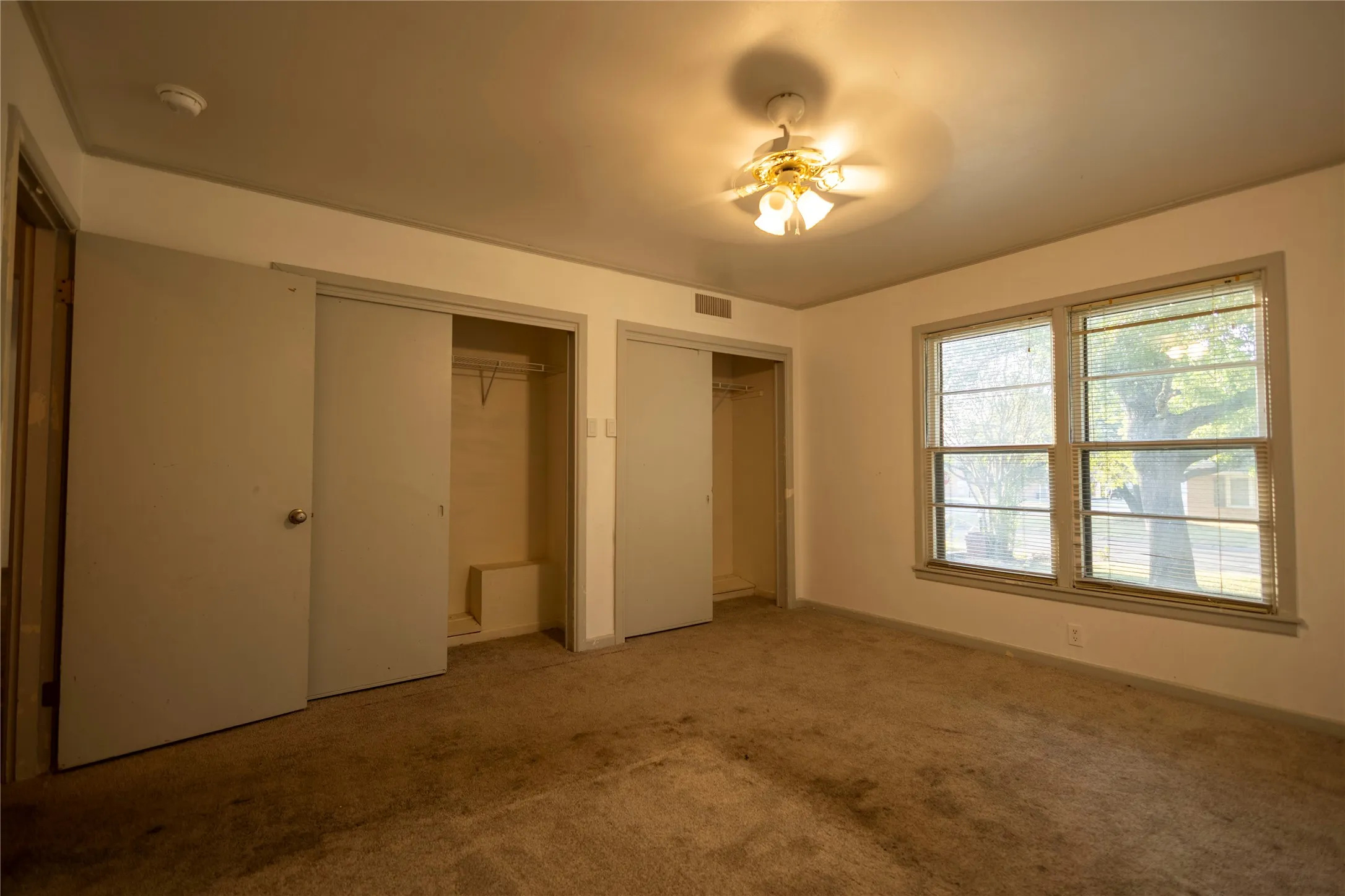 Recessed ceiling with an attached ceiling fan and light fixture