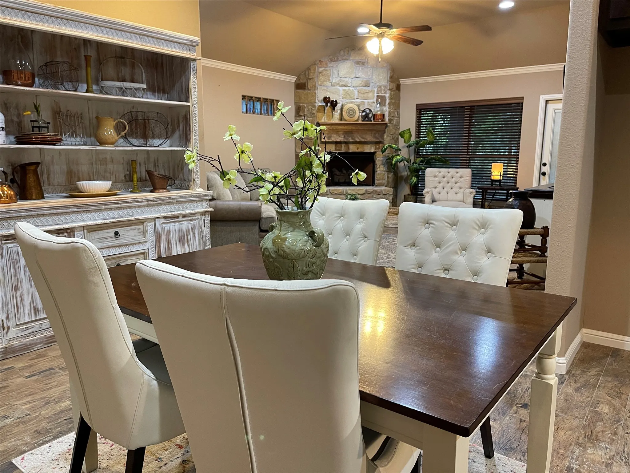 Formal dining area with wood-finish flooring