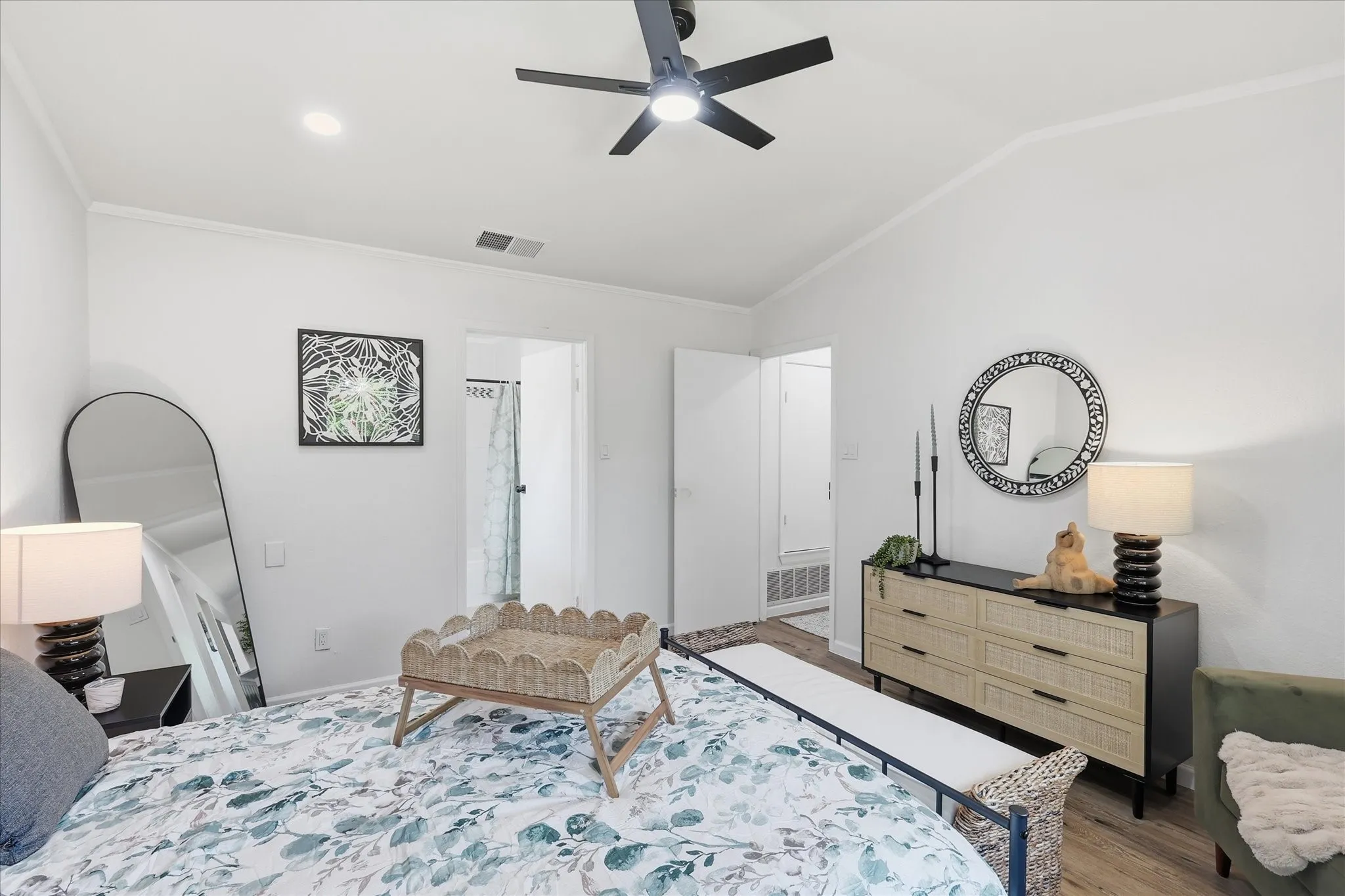 Vaulted ceiling with a ceiling fan, recessed lighting, and wood-finish flooring