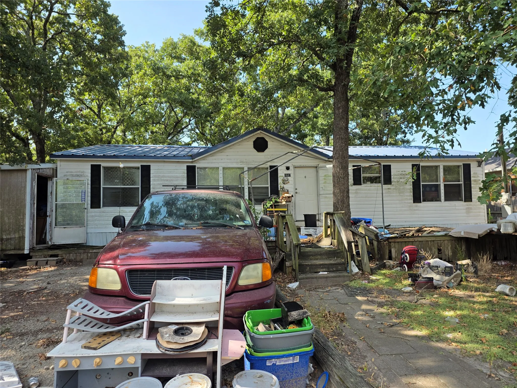 Manufactured Home For Sale in Hunt County , 1687 Northshore Road, Hawk Cove, Texas 75474, 3 Bedroom, 2 Bathroom, Garage spaces, 1,248 Sqft, built in 2000, mls#21354919, Real Estate Agent in Hawk Cove, Homes For Sale in Hunt county, Homes For Sale in Hawk Cove, Realtor in Hawk Cove Texas, Real Estate Brokerage Independent Realty Texas, Luminita Cordes Realtor