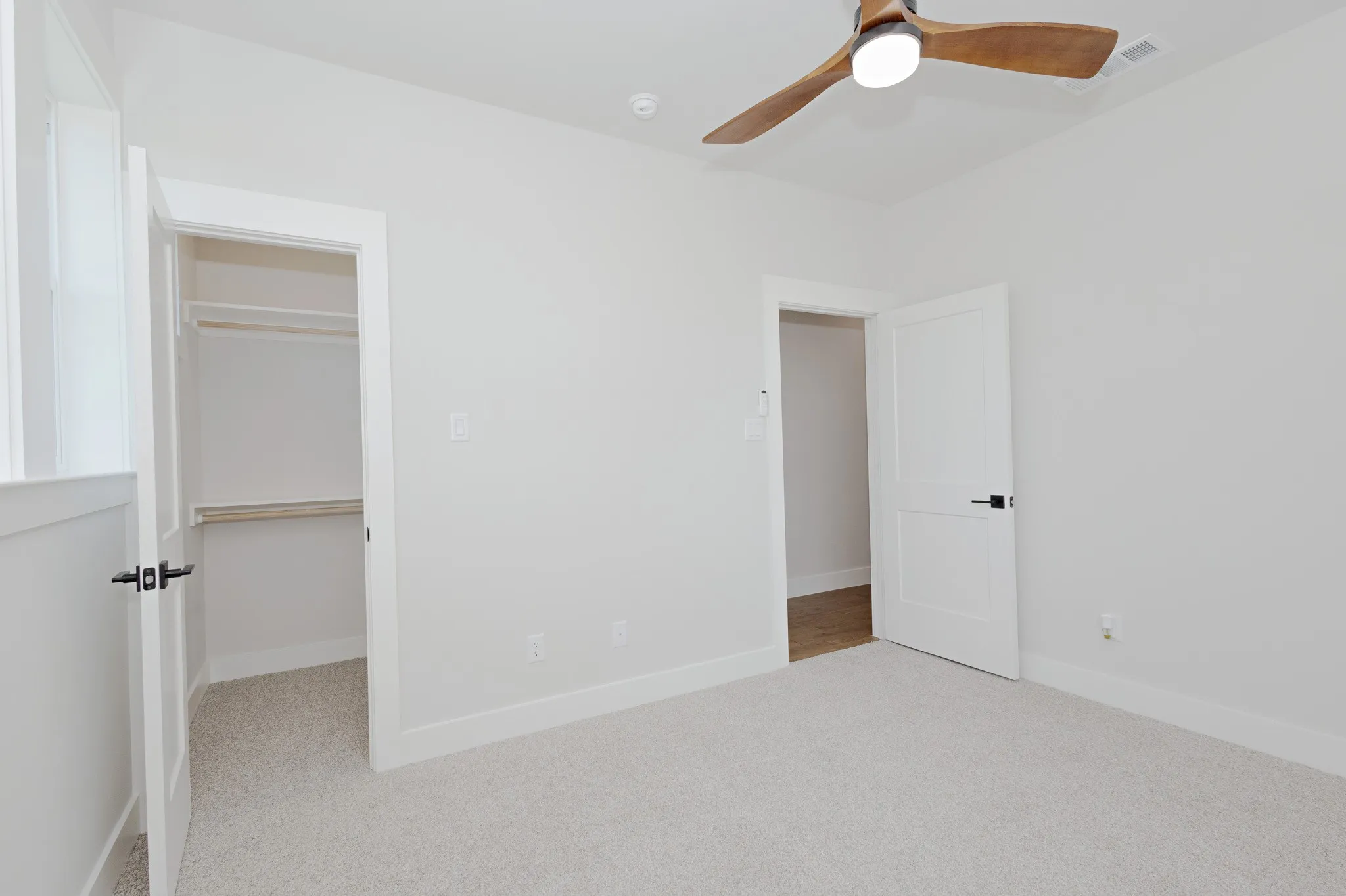 Guest Bedroom is designed for comfort with a walk-in closet.