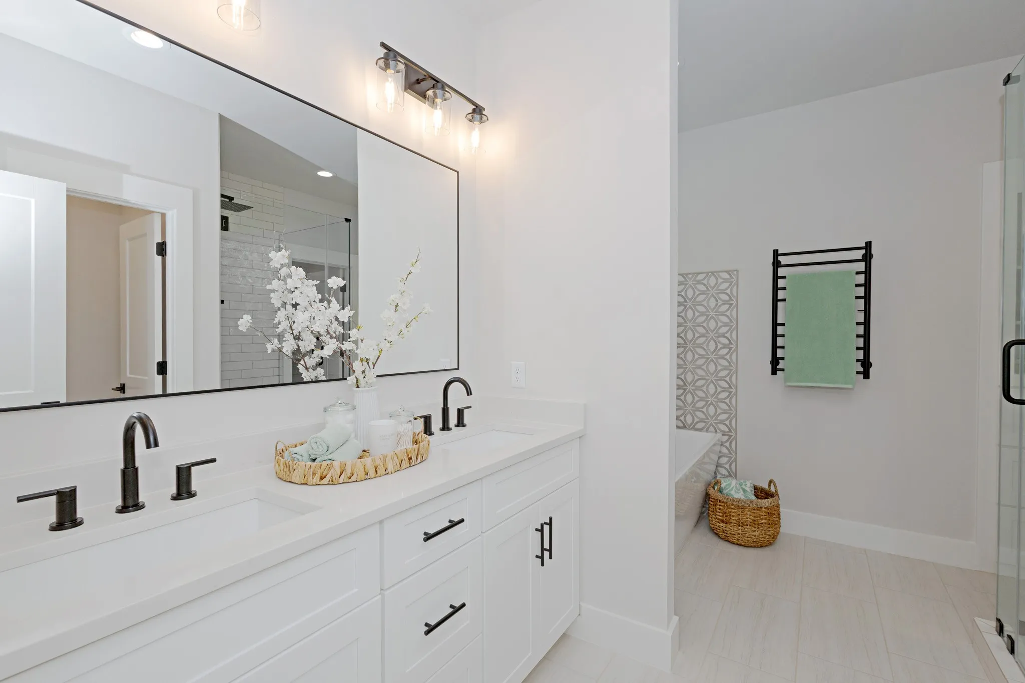 A spa-inspired Owner’s Suite Bathroom with Dual Vanities and Fully Extendable Soft Close Drawers and Deep Cabinets are just a few of the elegant details.